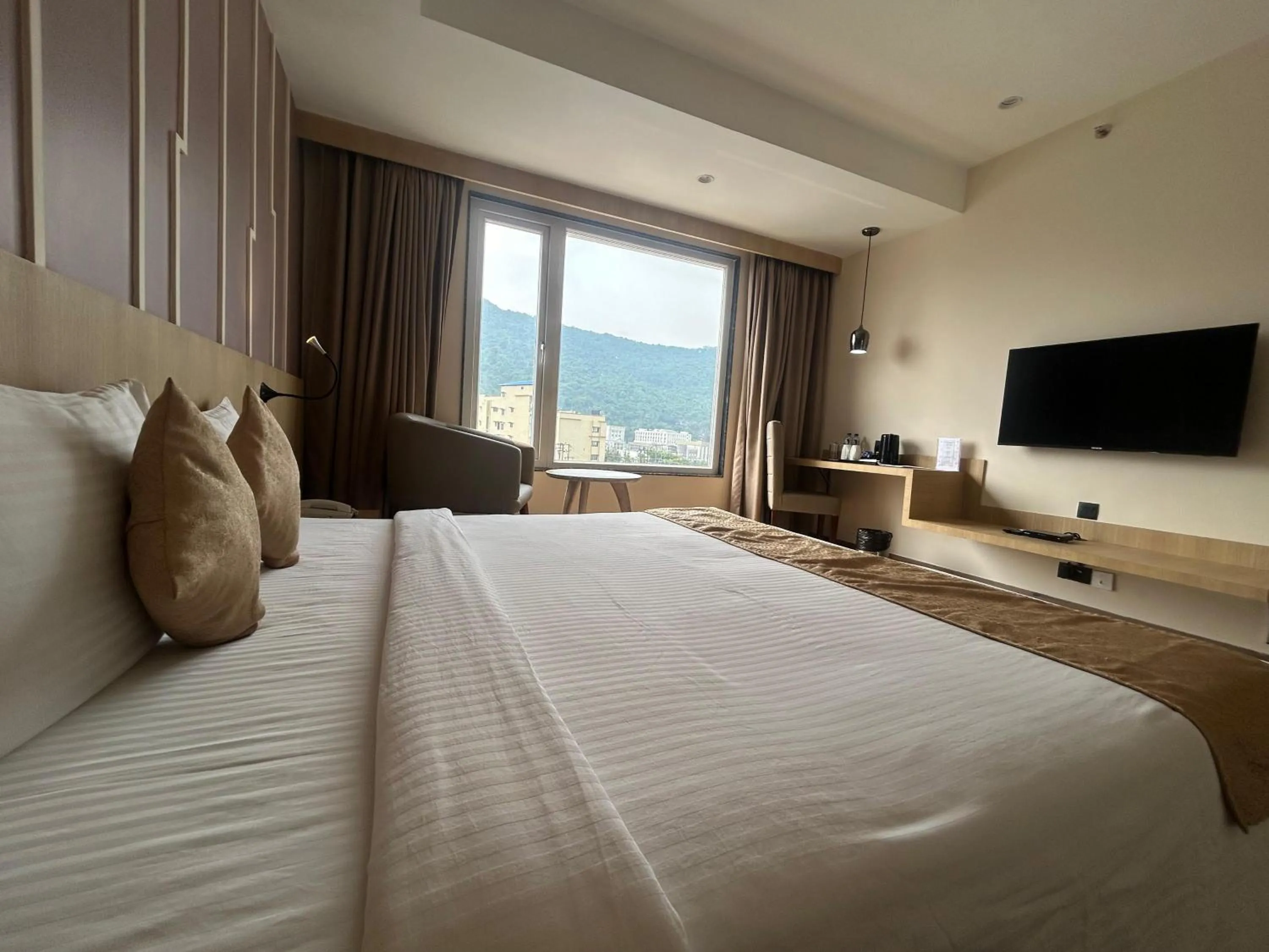 Bed in Sachika Hotels, Guwahati