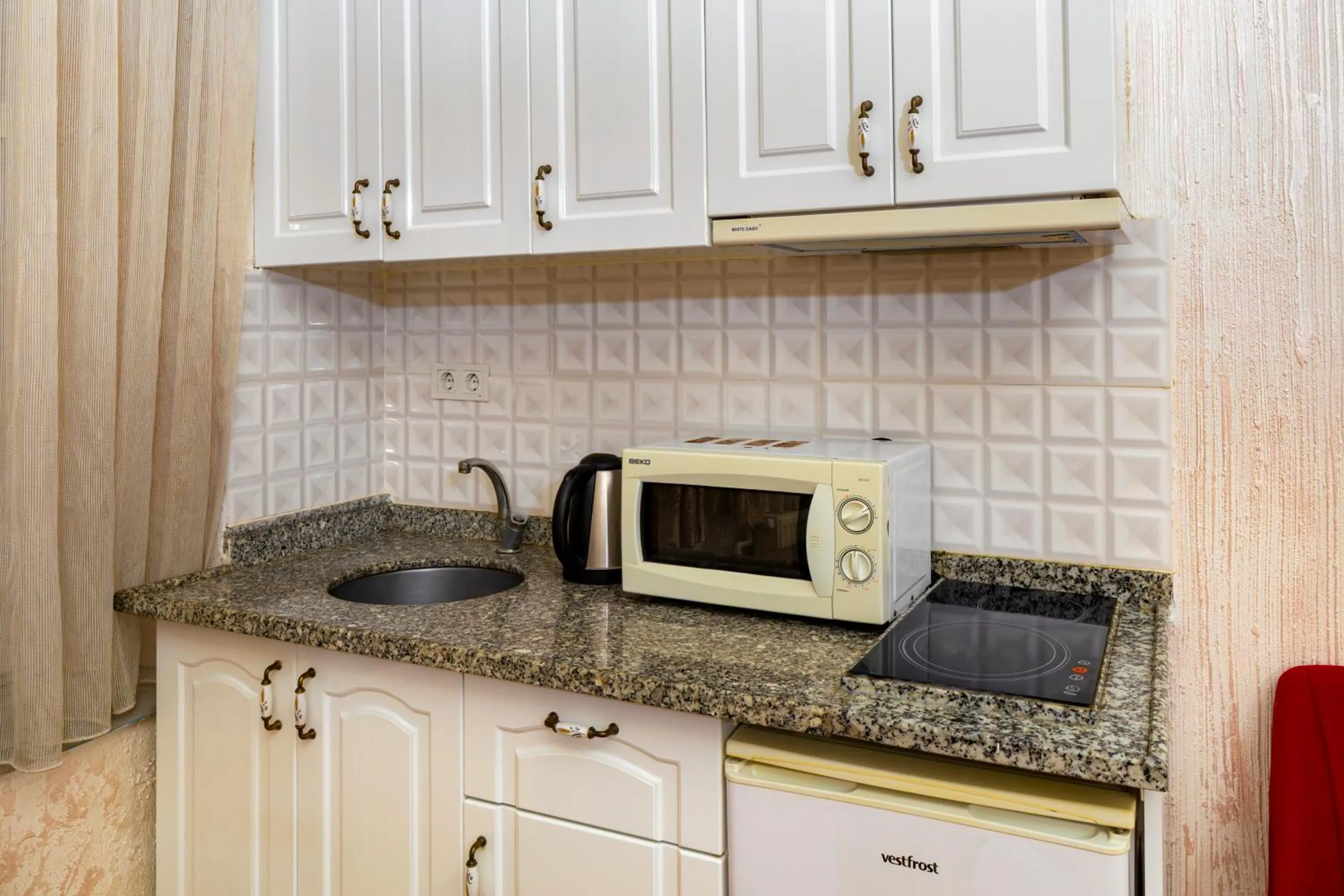 kitchen in Alhambra Apart Hotel