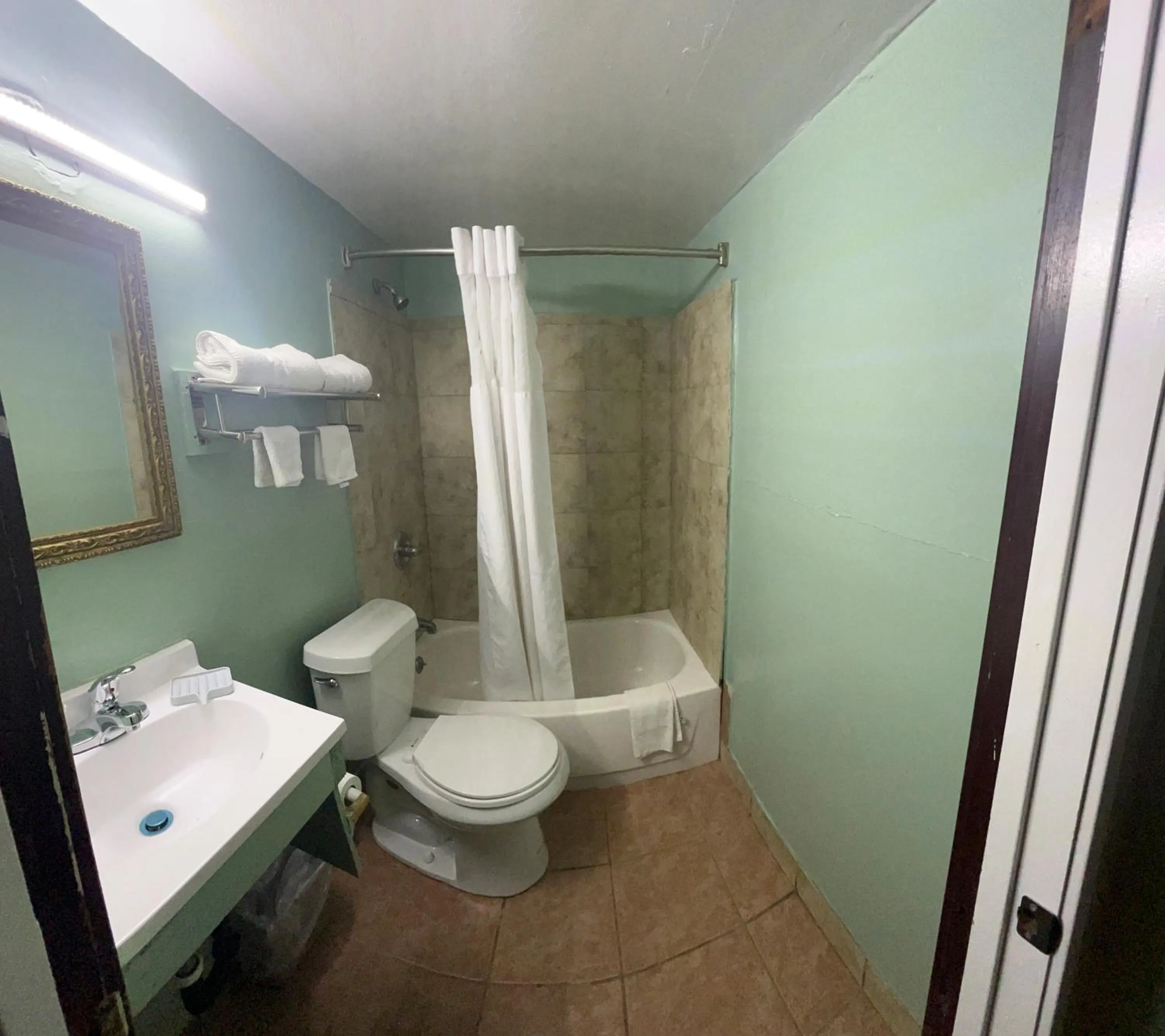 Toilet in Town & Country Motel