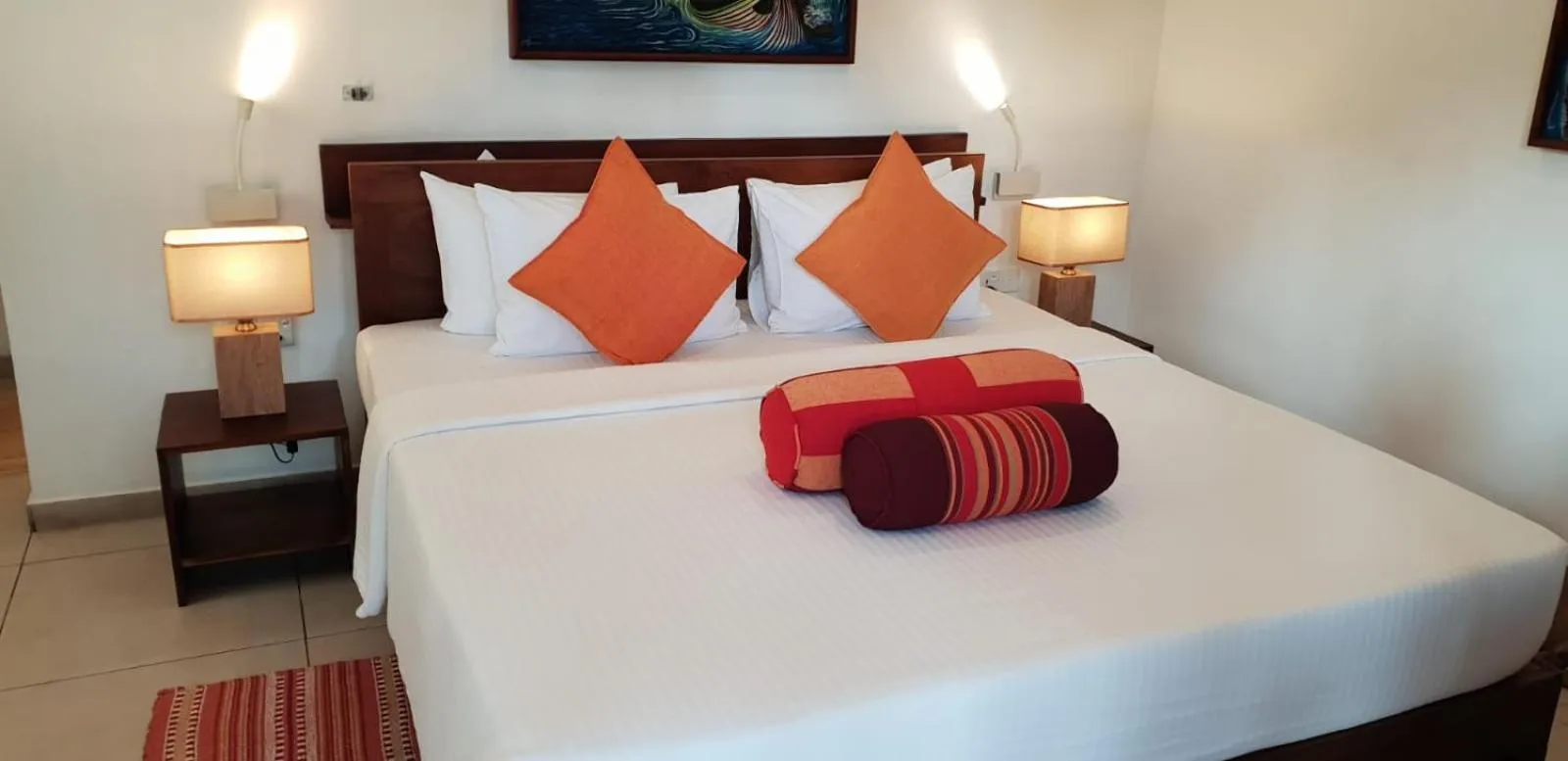 Bed in Rockside Cabanas Hotel