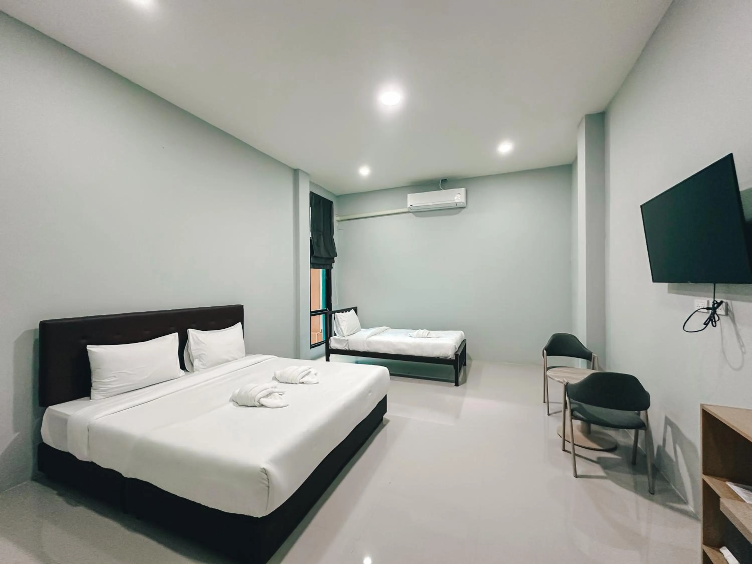 Bed in Tuscany Hotel Buriram