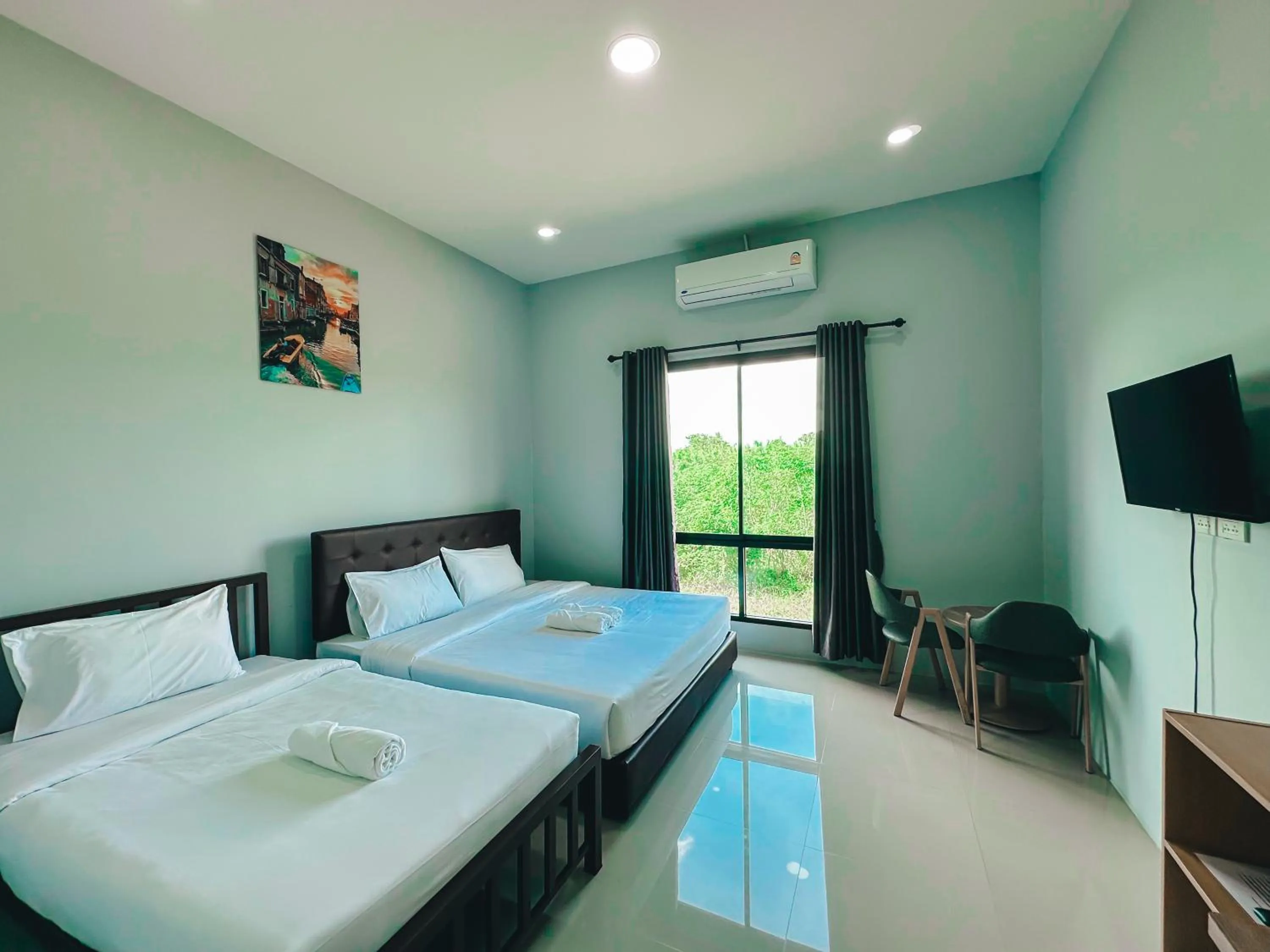 Bed in Tuscany Hotel Buriram