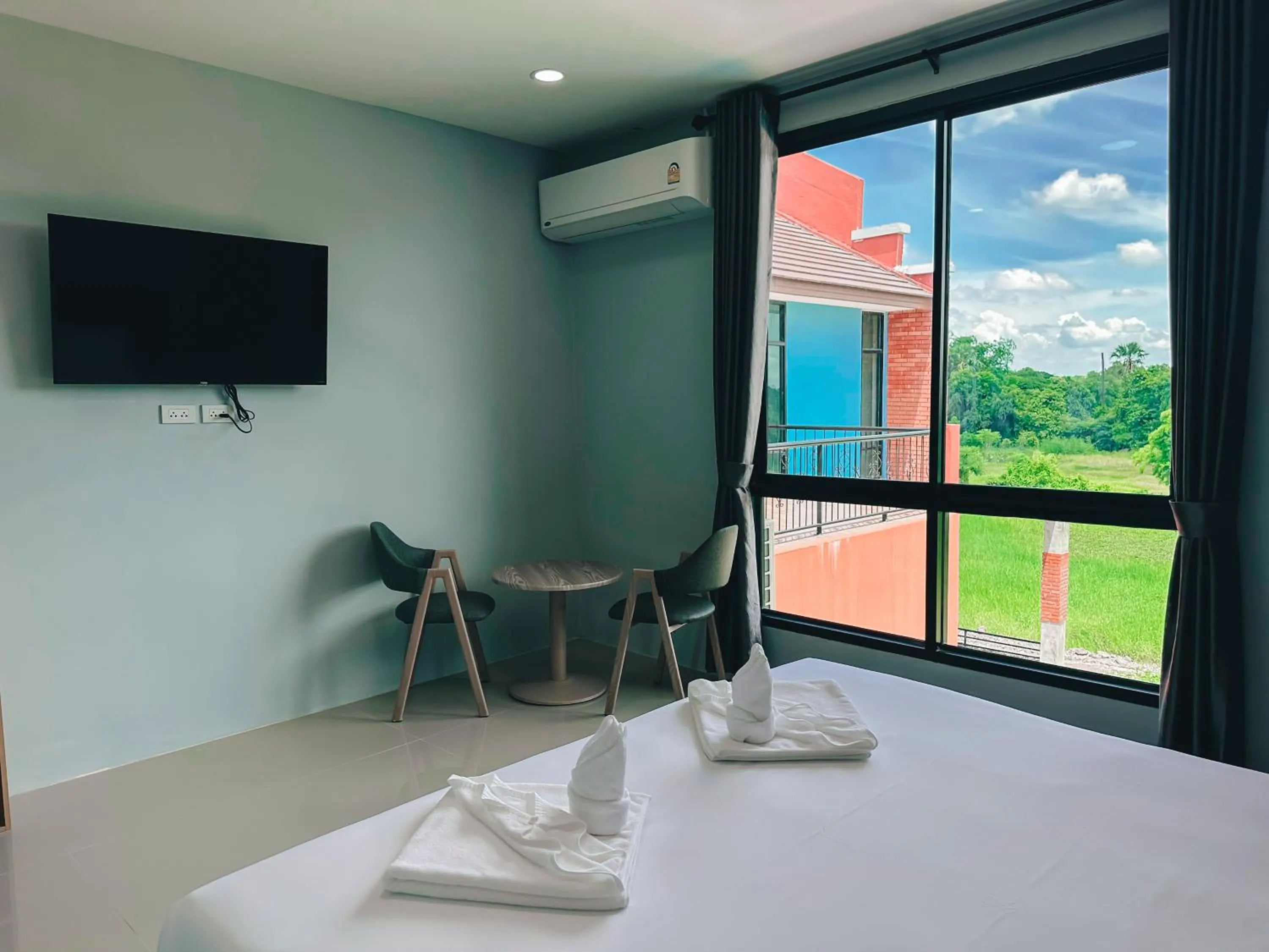 Bed in Tuscany Hotel Buriram