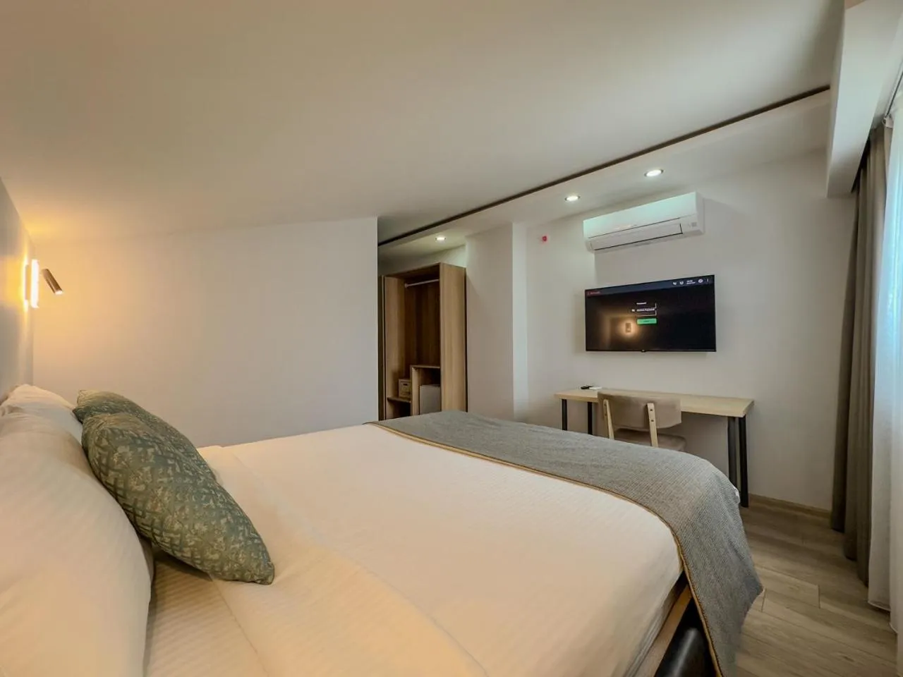 Bed in Leaf River Suites