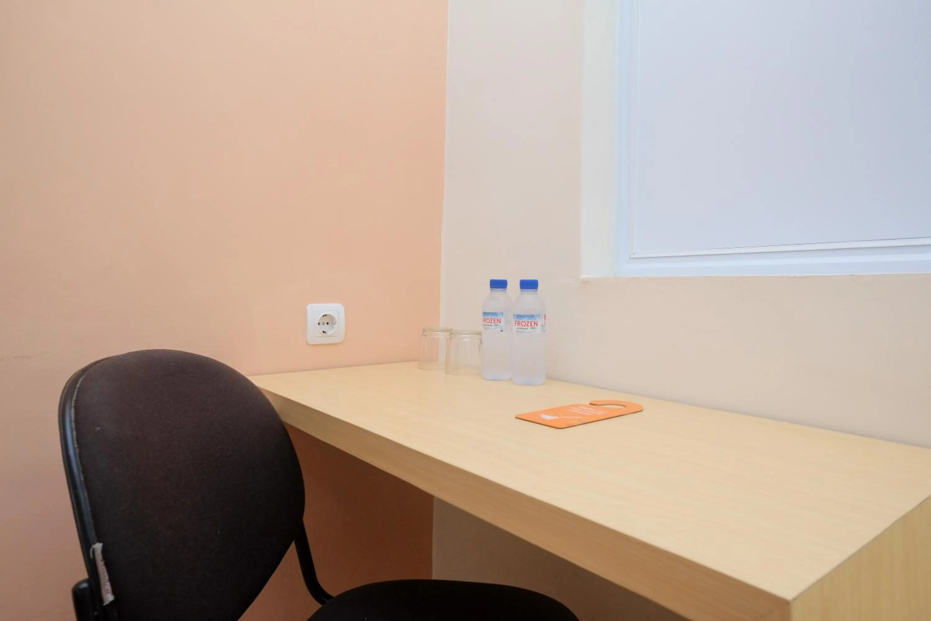 Bedroom in Sans Hotel City Park Medoho Semarang