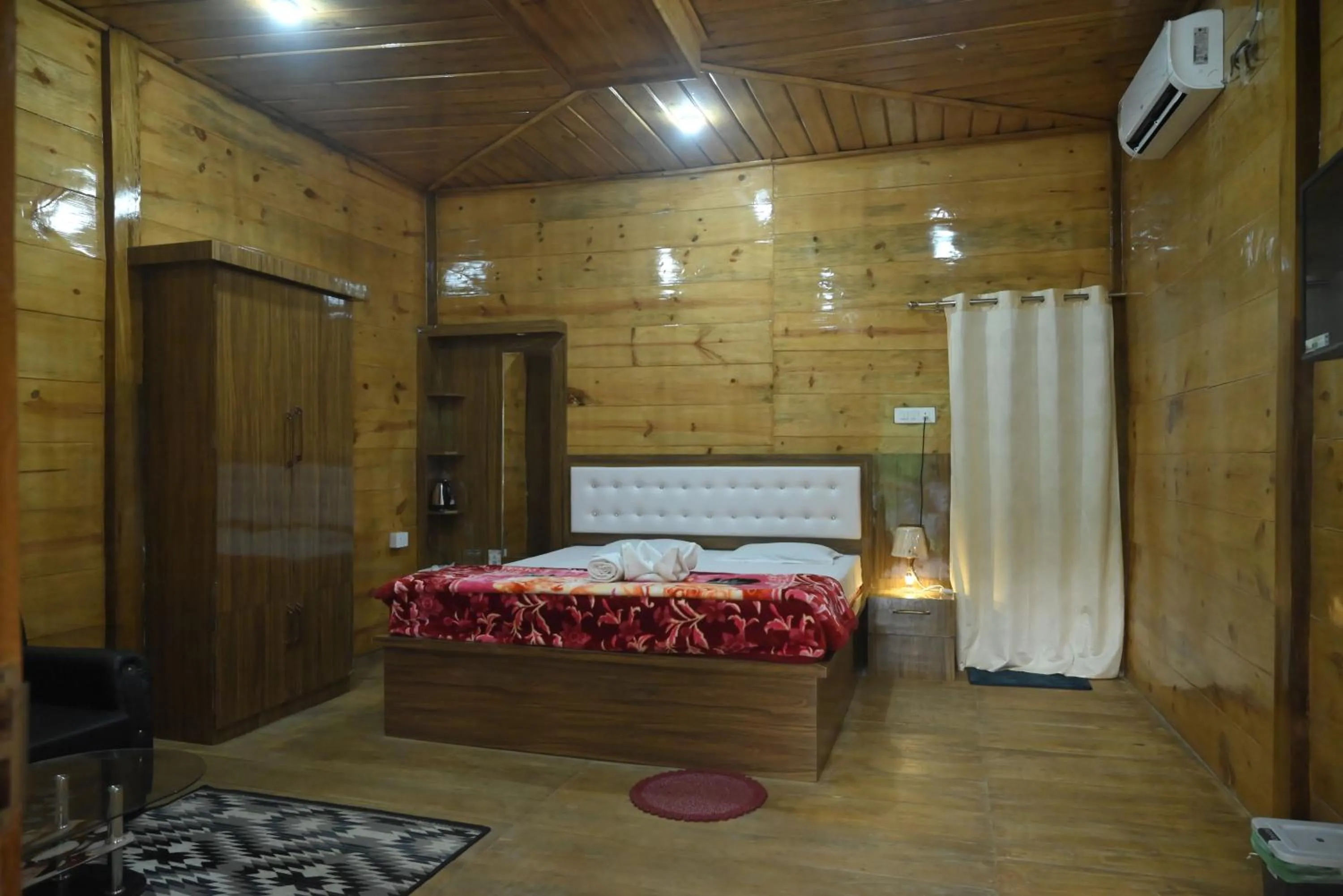 Bed in De Aloha Resort