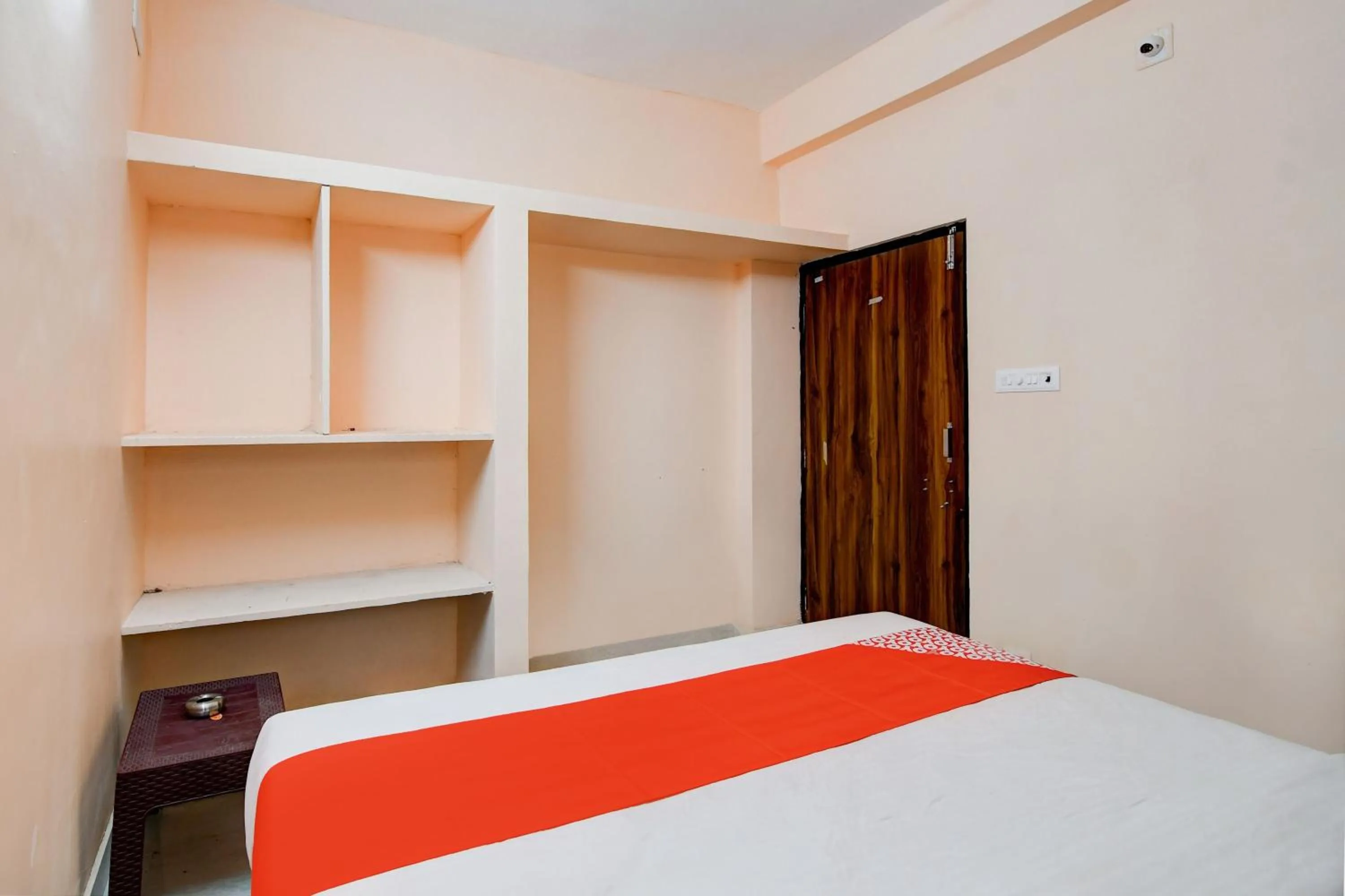 Bedroom in Hotel O Flagship S S Guesthouse