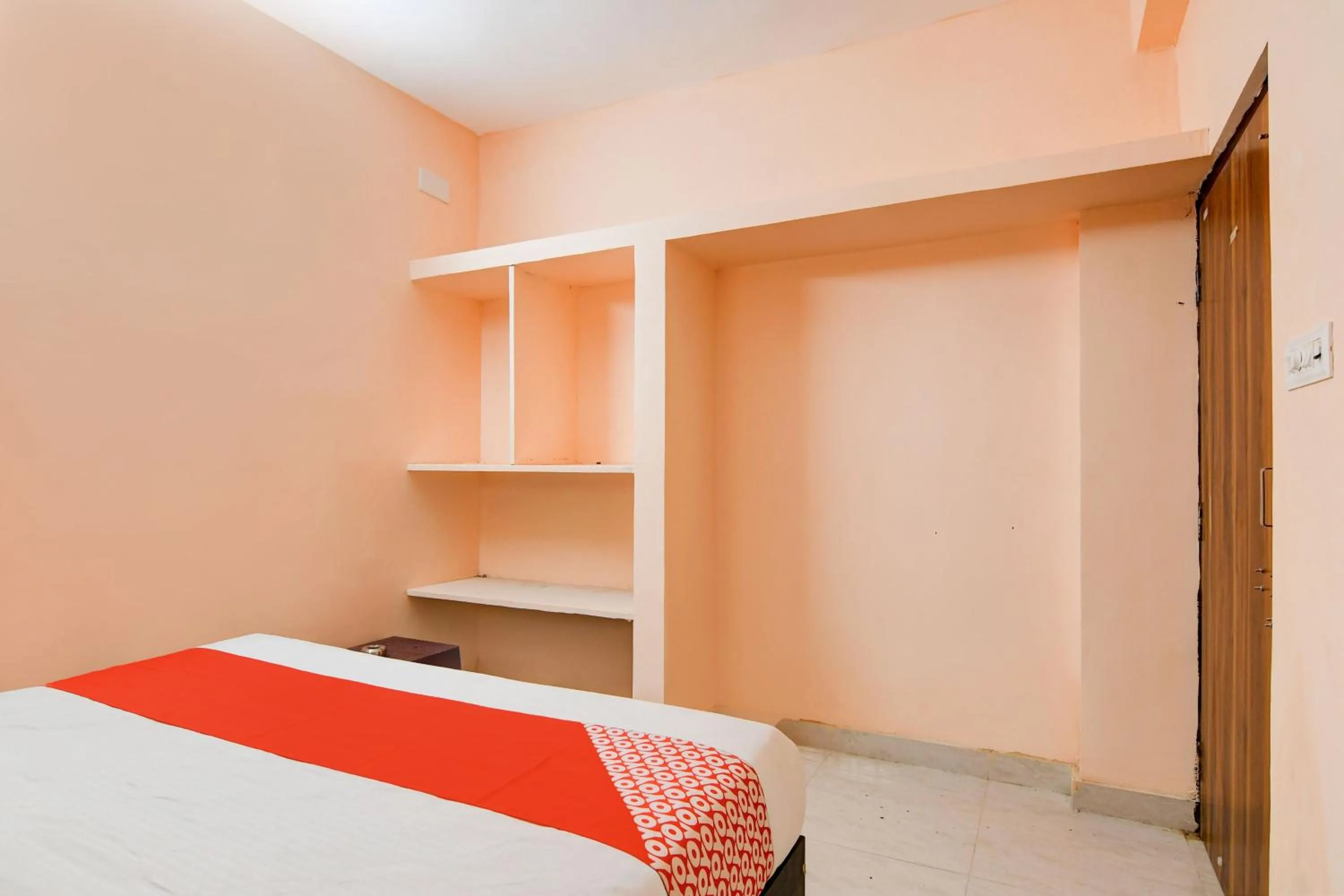 Bedroom in Hotel O Flagship S S Guesthouse