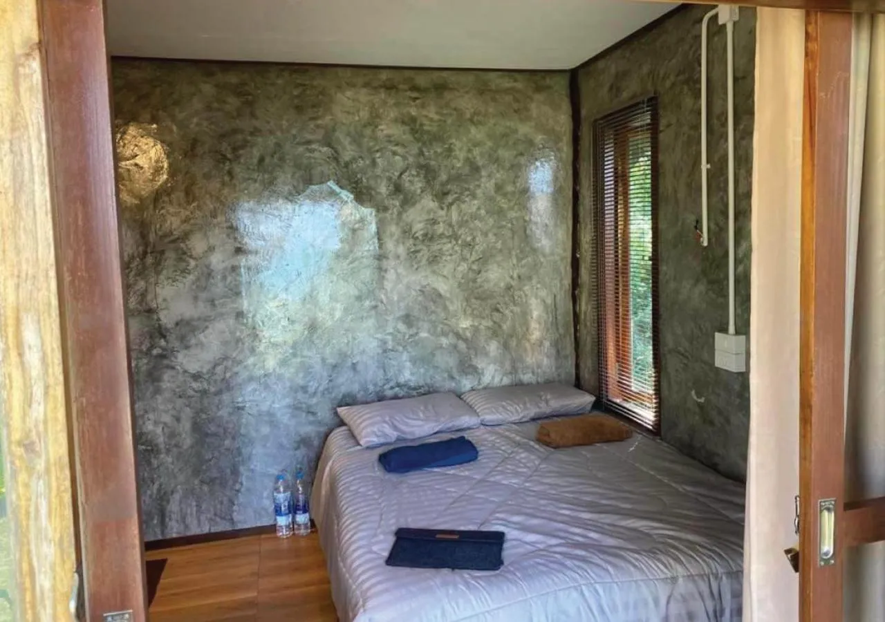 Bed in The Ngam Kho Resort