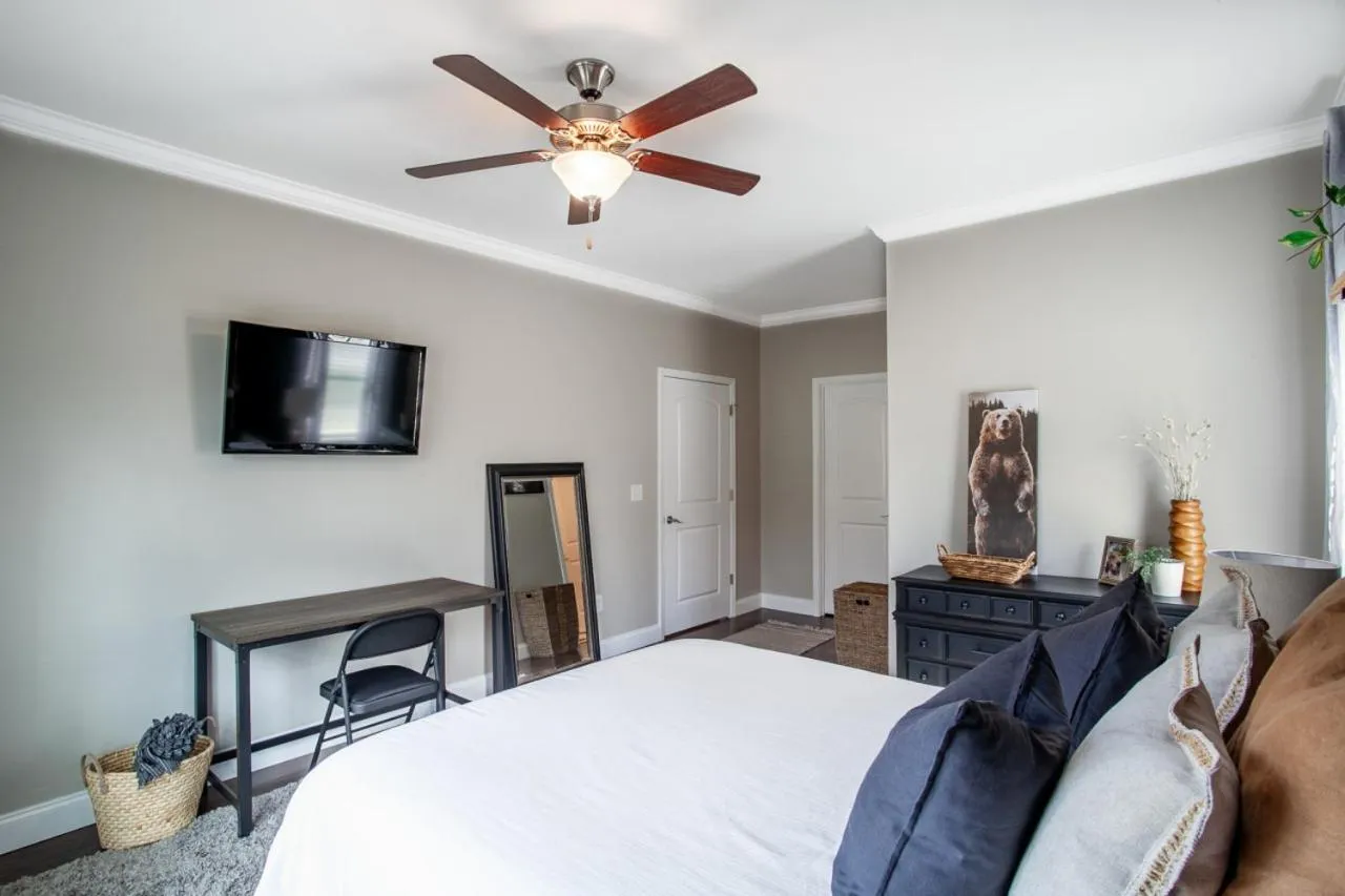 Bed in Elegant End Condo Fireplace Community Amenities