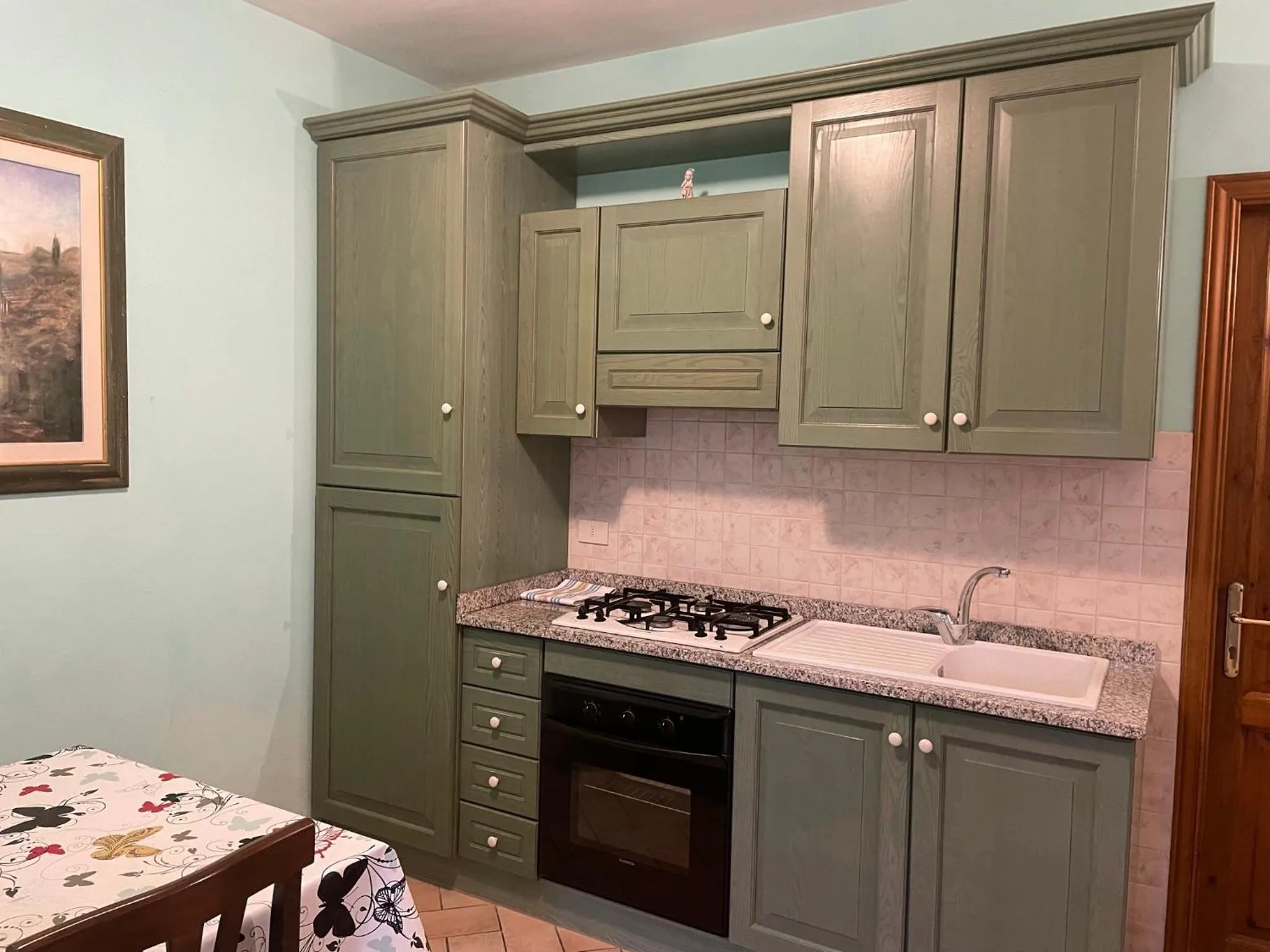 Kitchen or kitchenette in Casa Vacanza Le Case