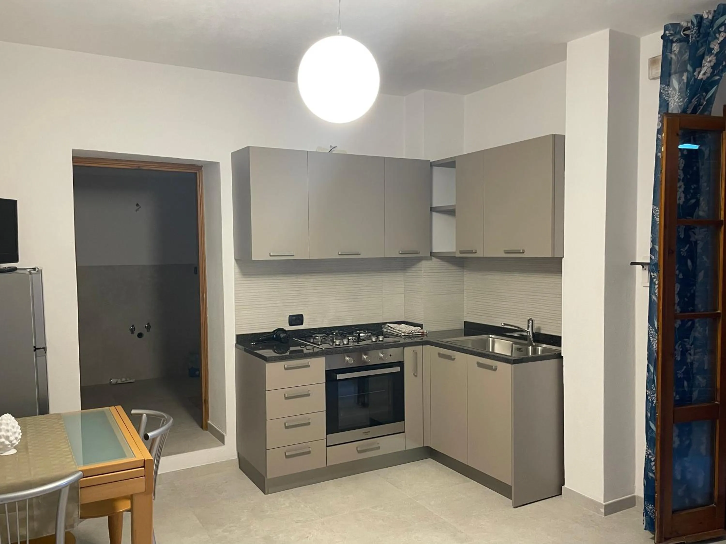 Kitchen or kitchenette in Casa Vacanza Le Case