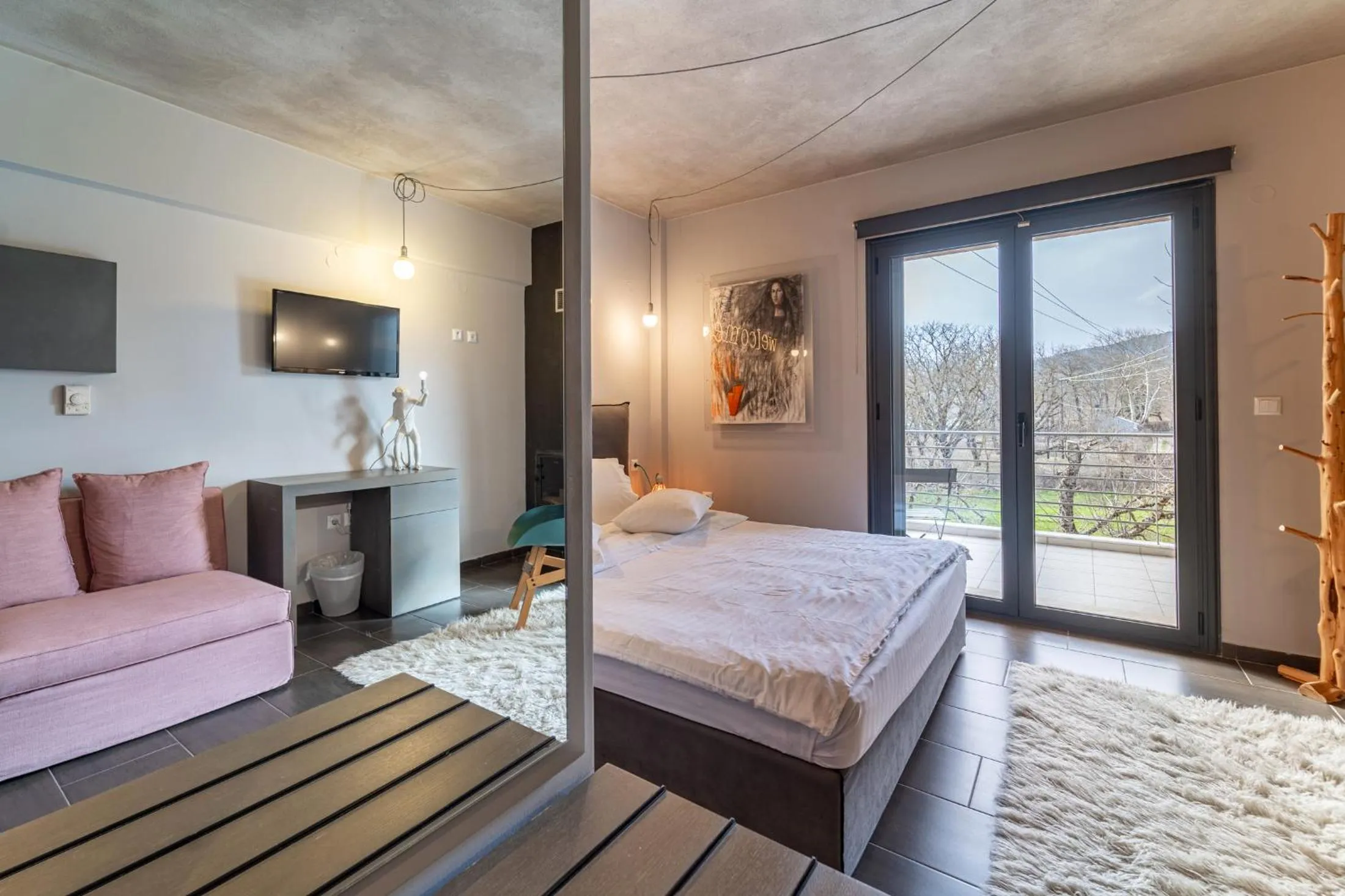 Bed in Oniropetra Boutique Hotel