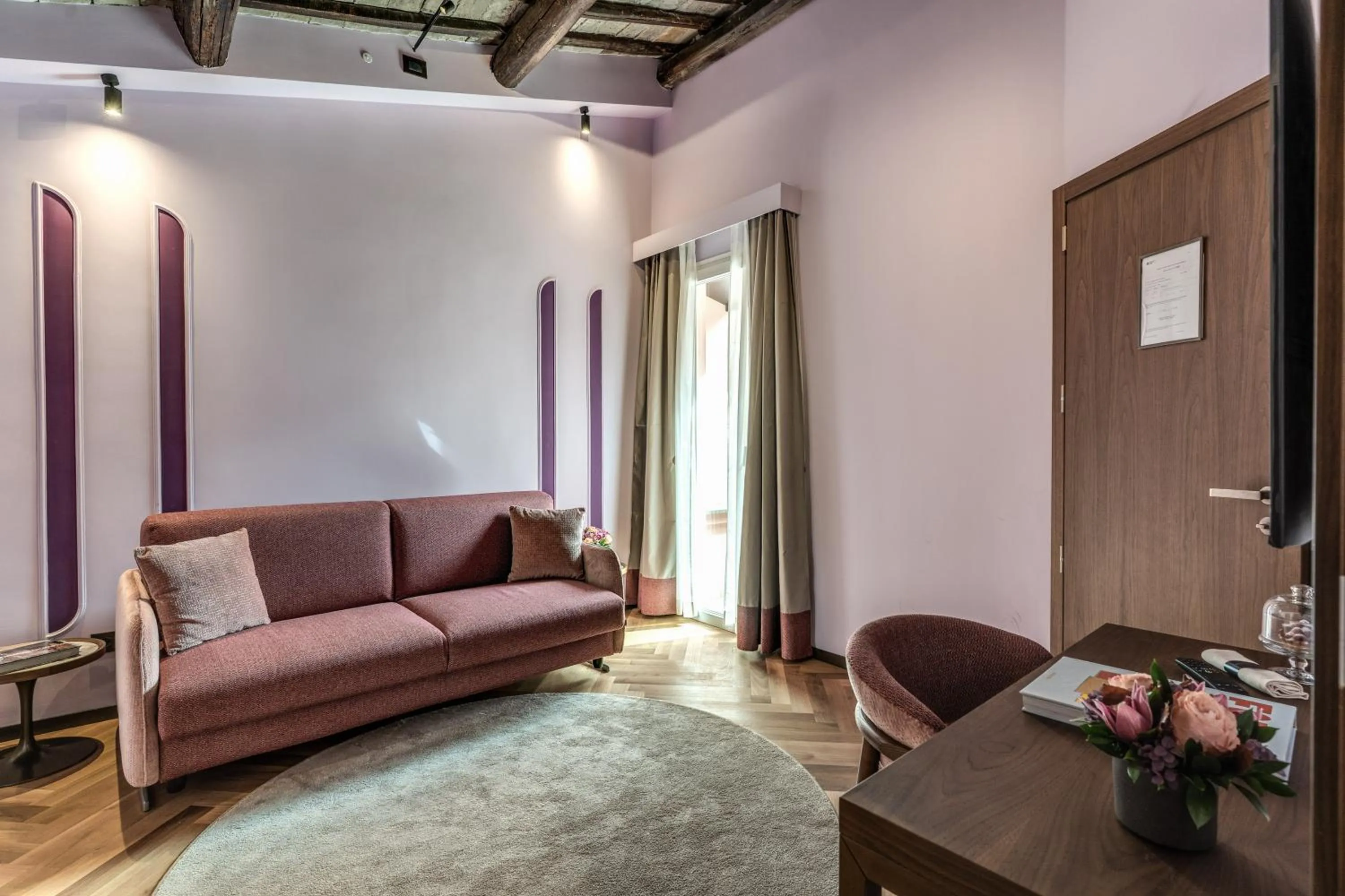 Seating area, Bed in THE STEPS Hotel - by Eitch Collection