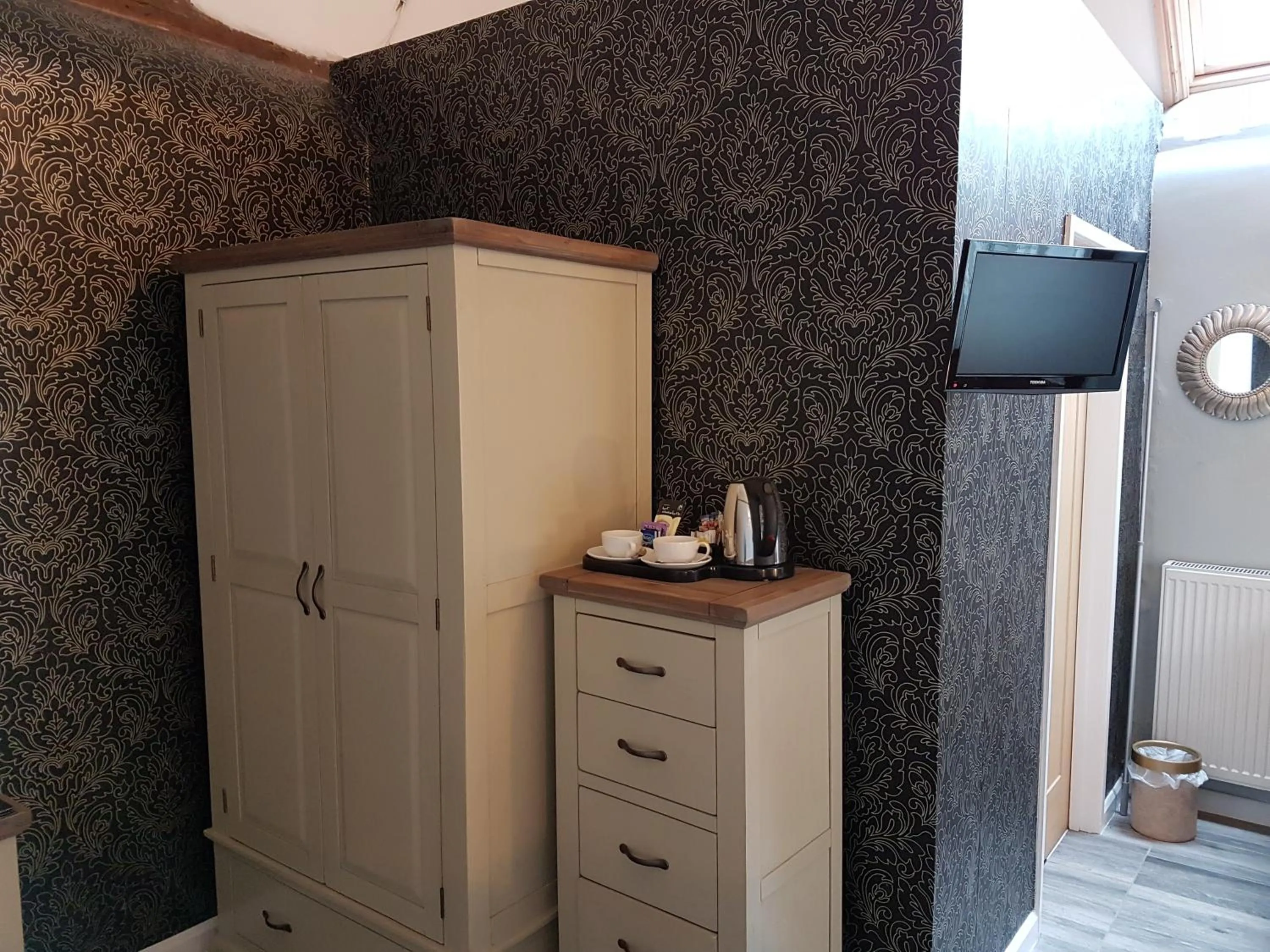 Bedroom in Curly Tail Accommodation