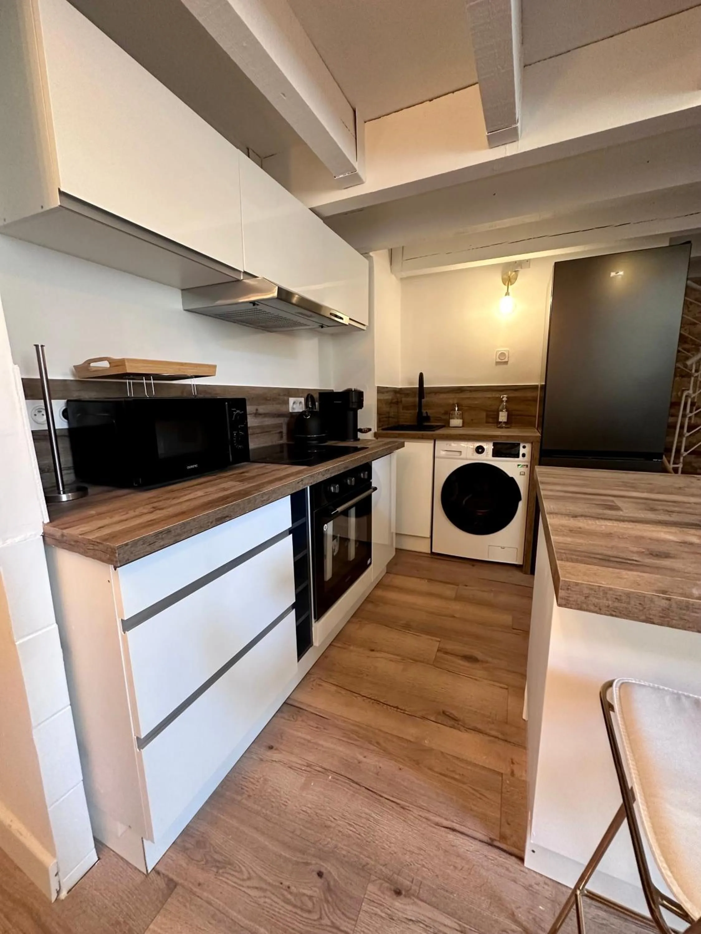 Kitchen or kitchenette in Duplex à 2 min des arènes et de la maison carrée