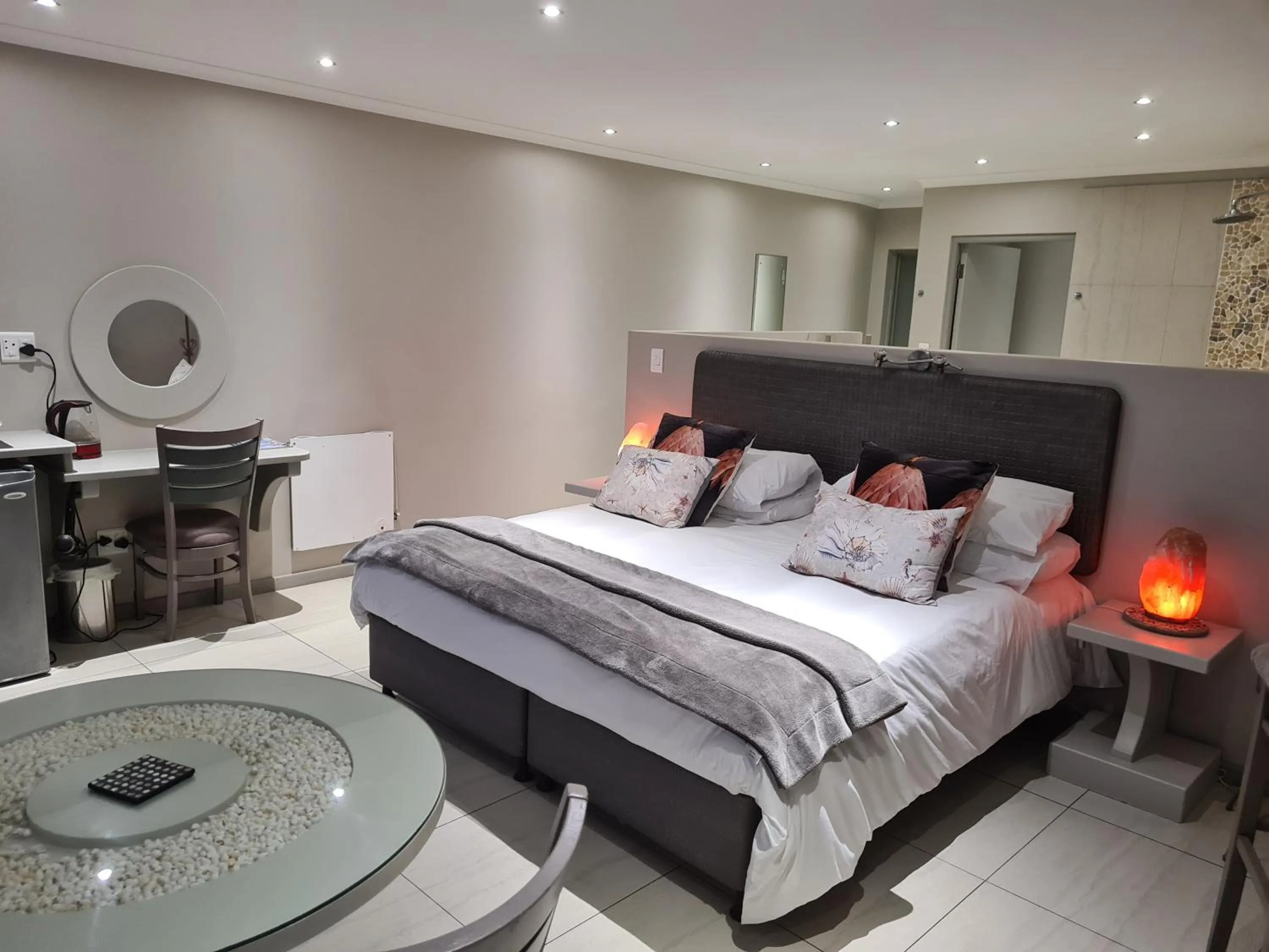 Bed in Crystal Lagoon Lodge