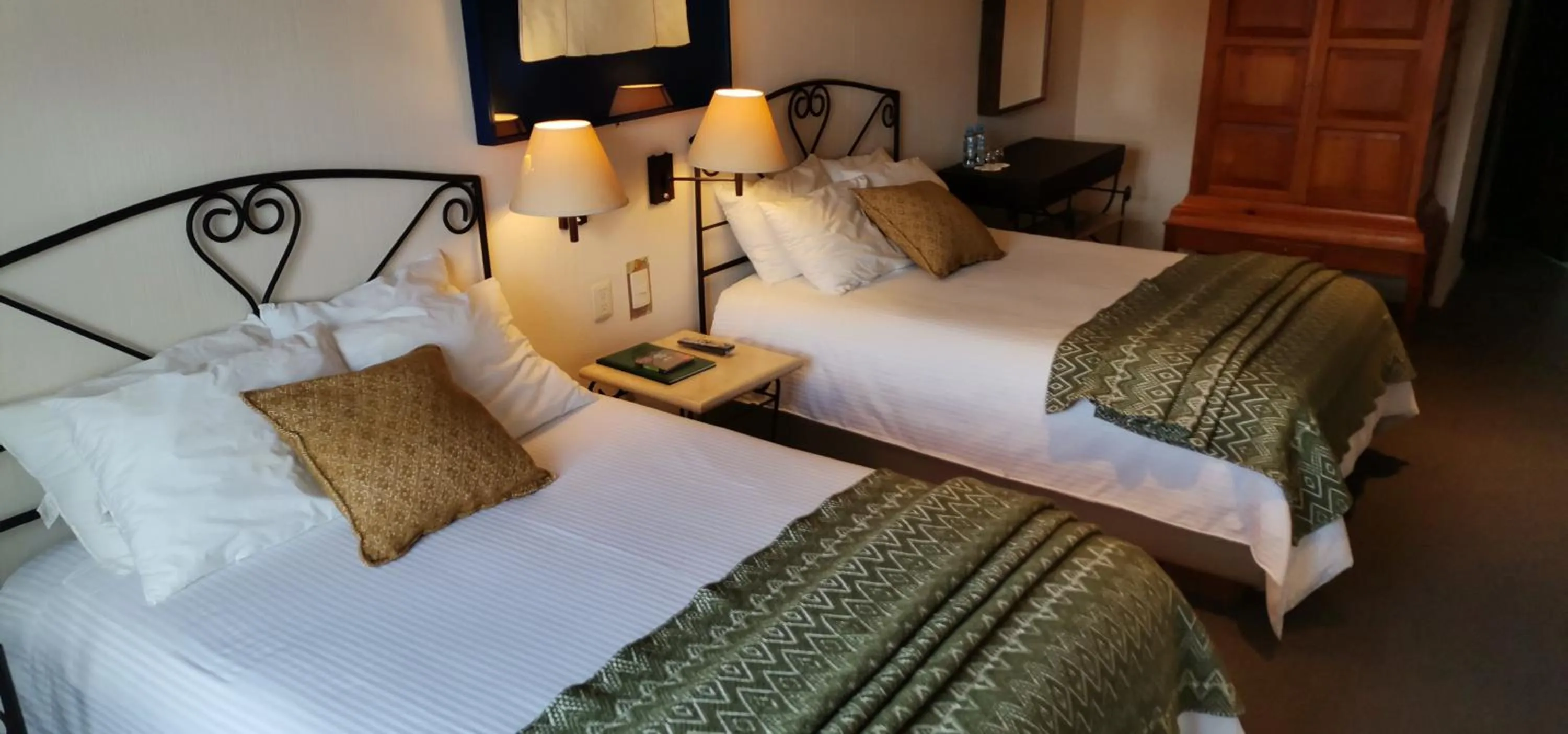 Bed in Mision Grand San Cristobal de las Casas