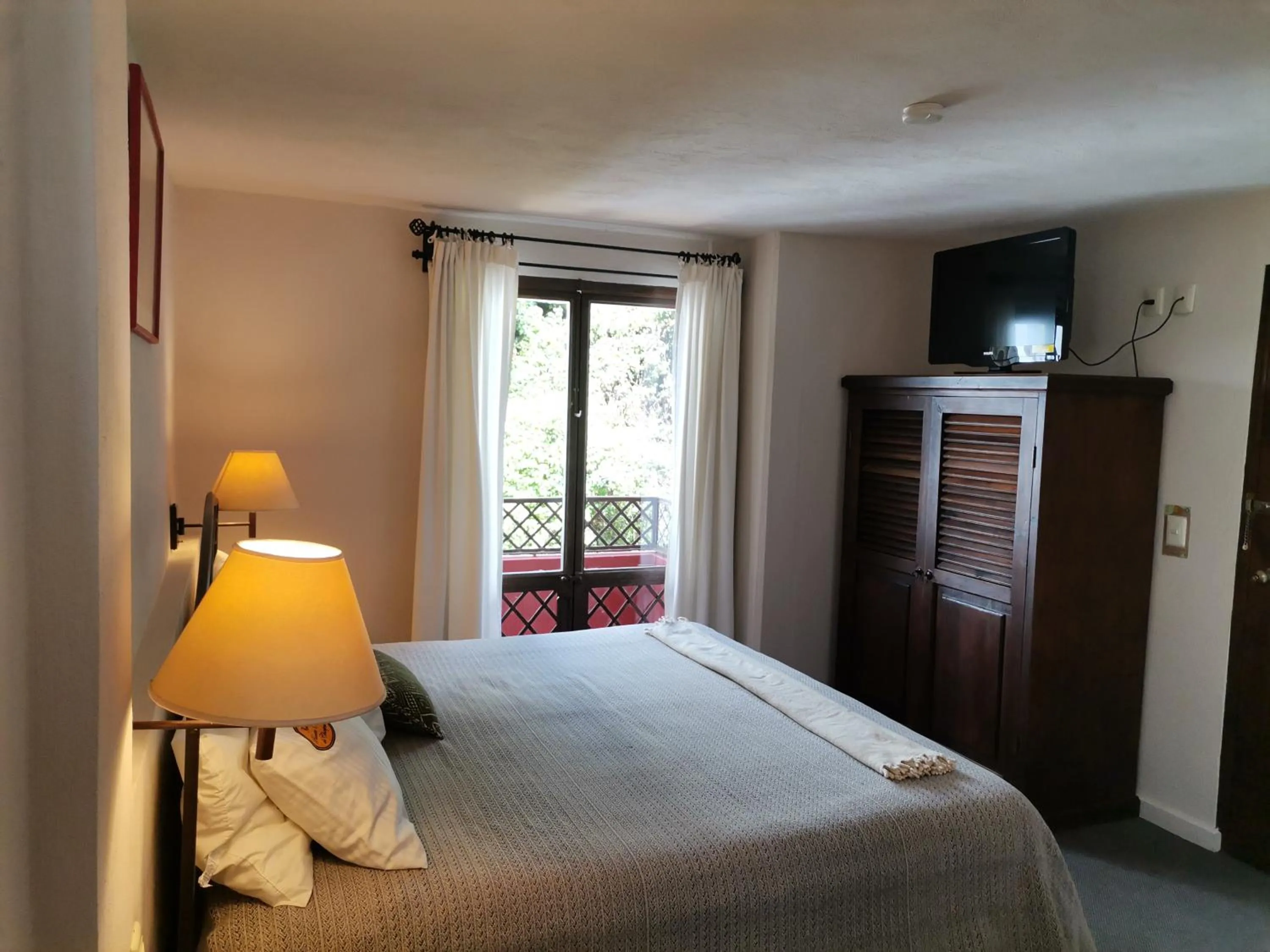 Bed in Mision Grand San Cristobal de las Casas