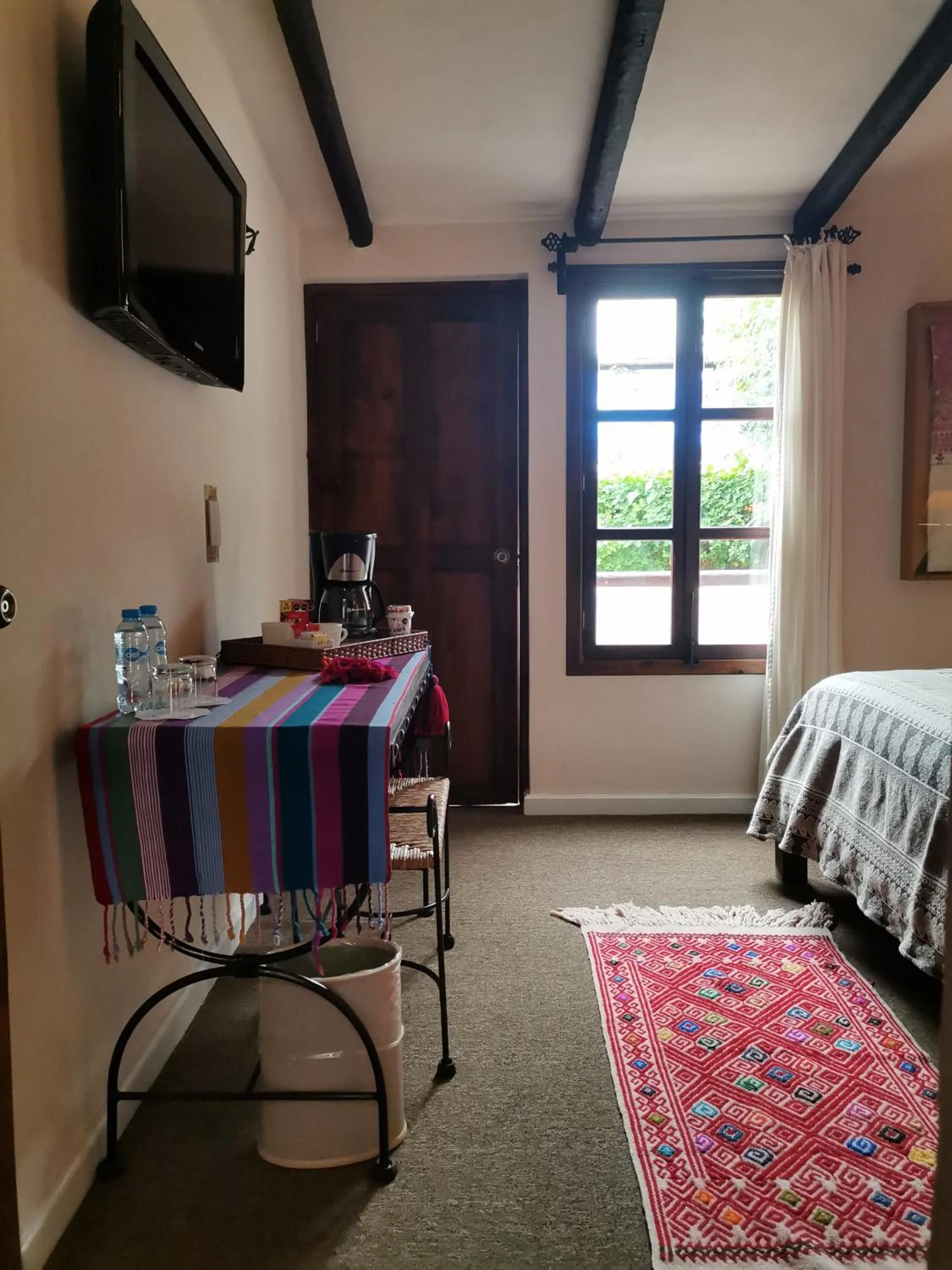 Bed in Mision Grand San Cristobal de las Casas