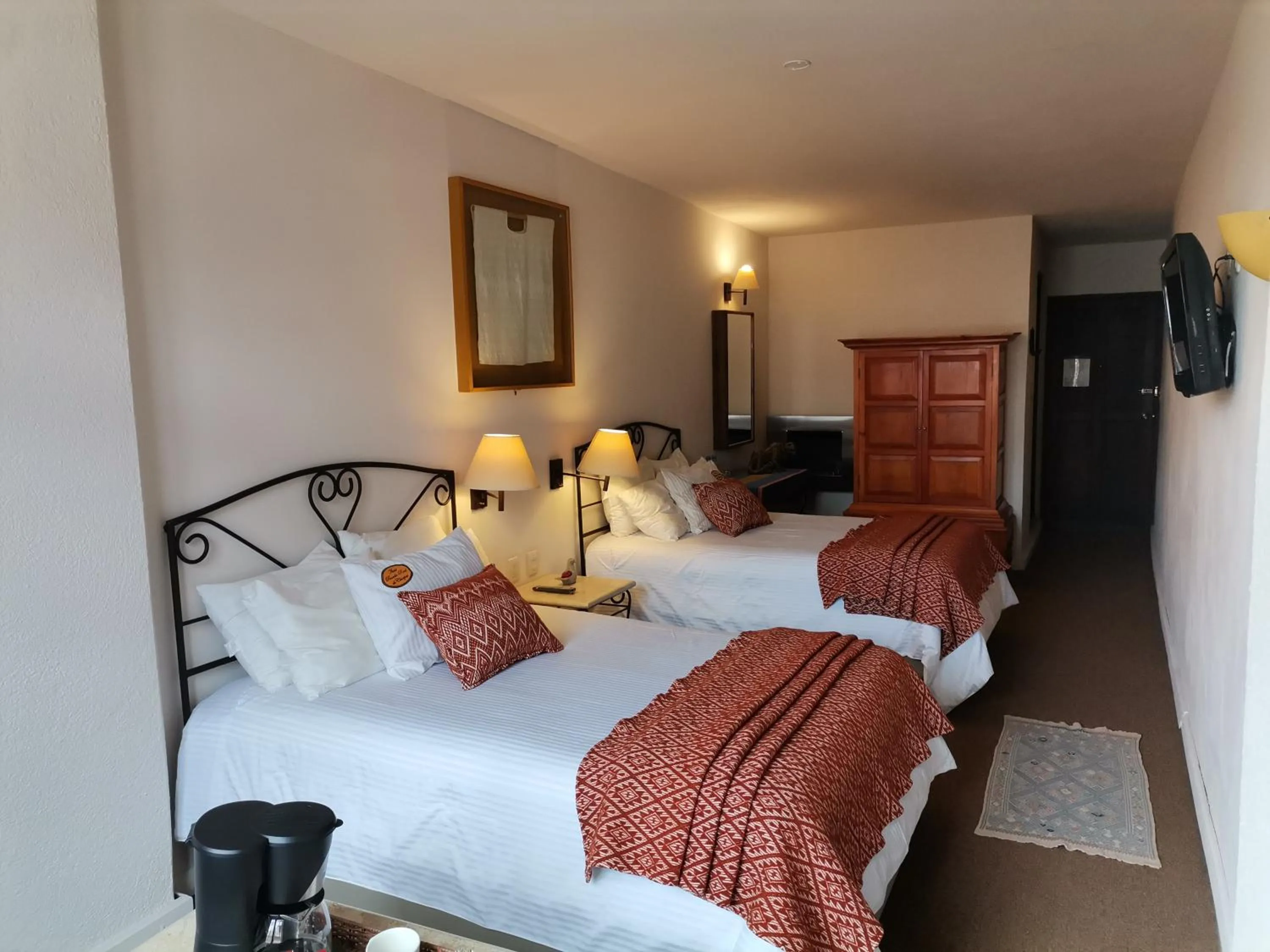 Bed in Mision Grand San Cristobal de las Casas