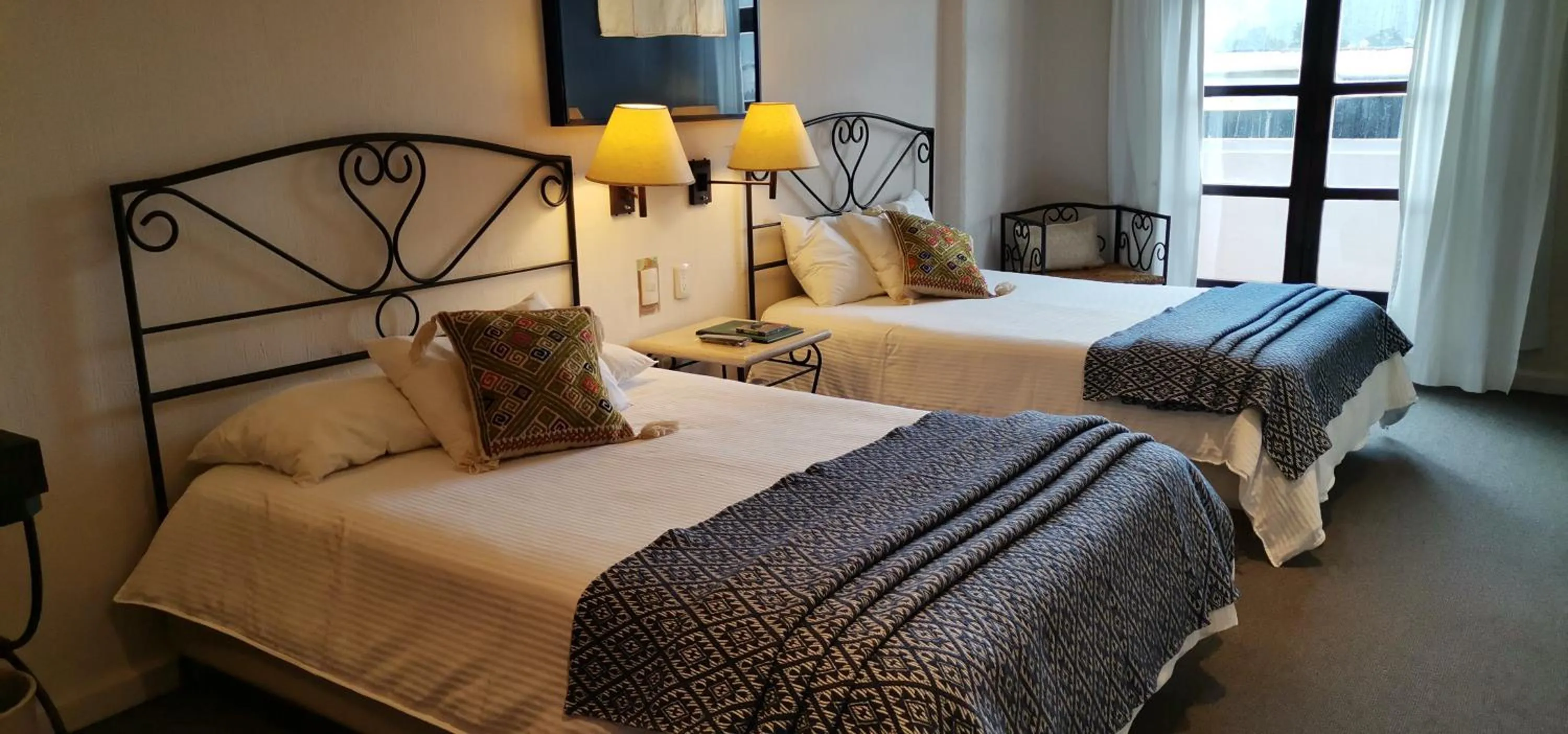 Bed in Mision Grand San Cristobal de las Casas