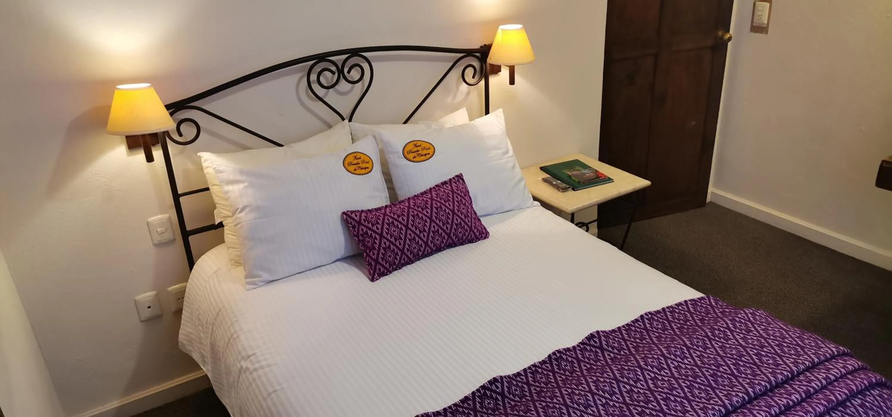 Bed in Mision Grand San Cristobal de las Casas