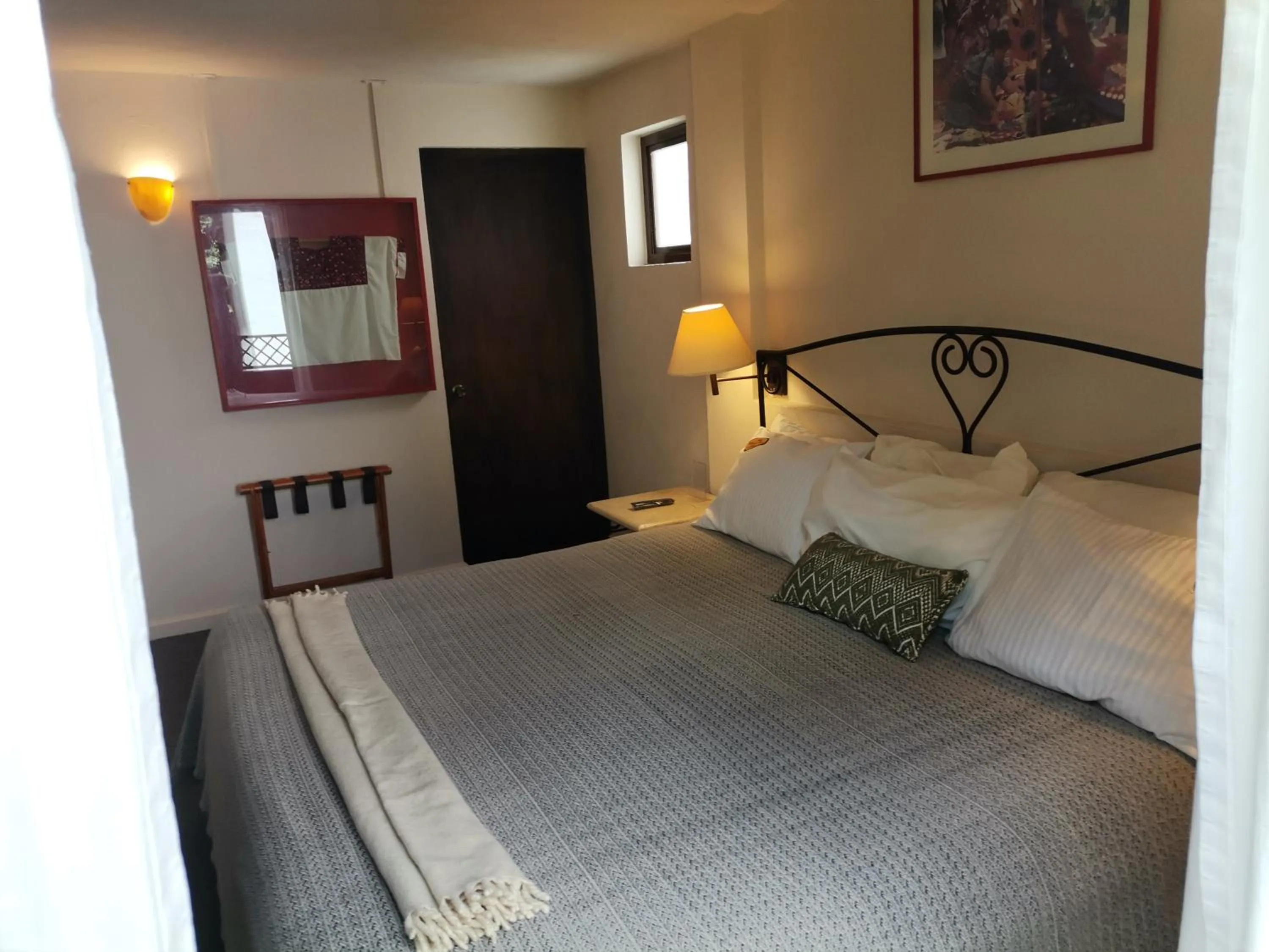 Bed in Mision Grand San Cristobal de las Casas