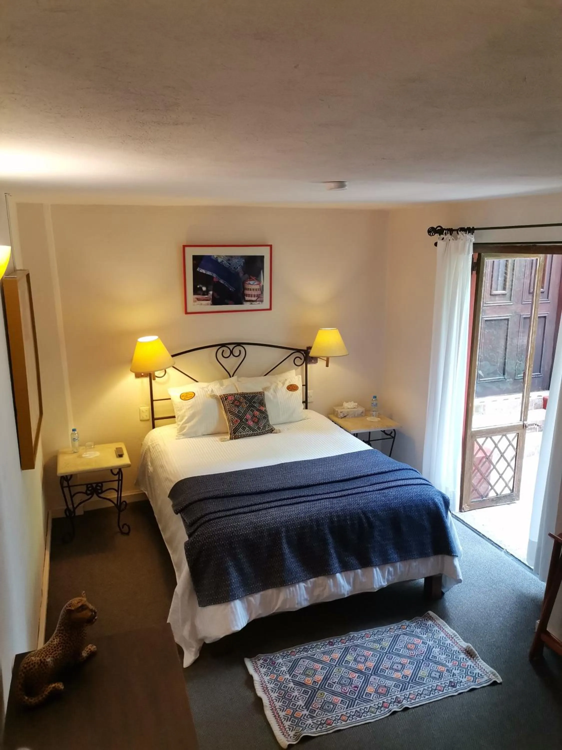 Bed in Mision Grand San Cristobal de las Casas