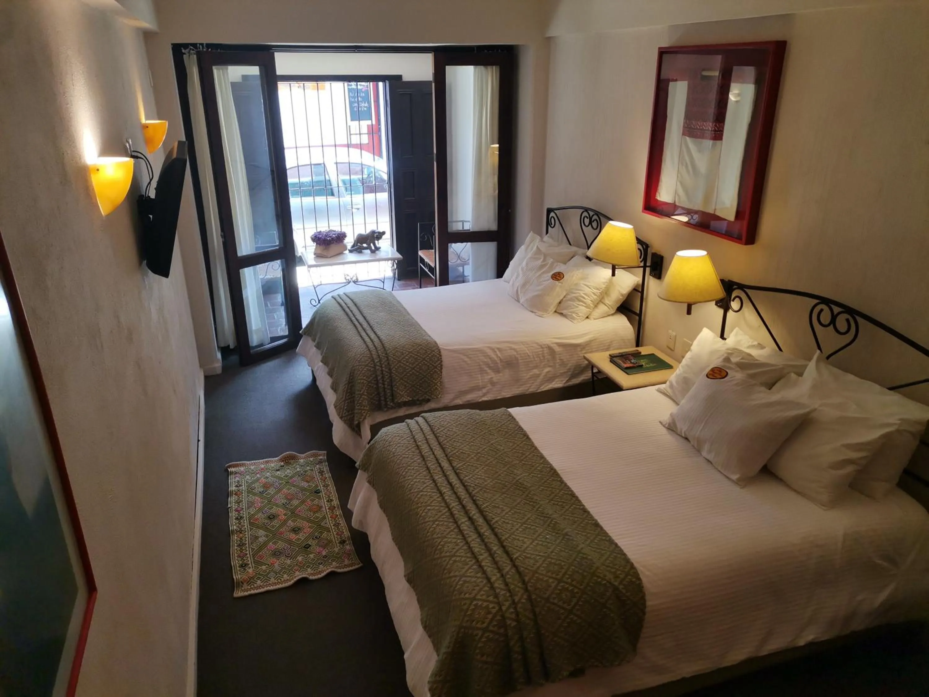 Bed in Mision Grand San Cristobal de las Casas