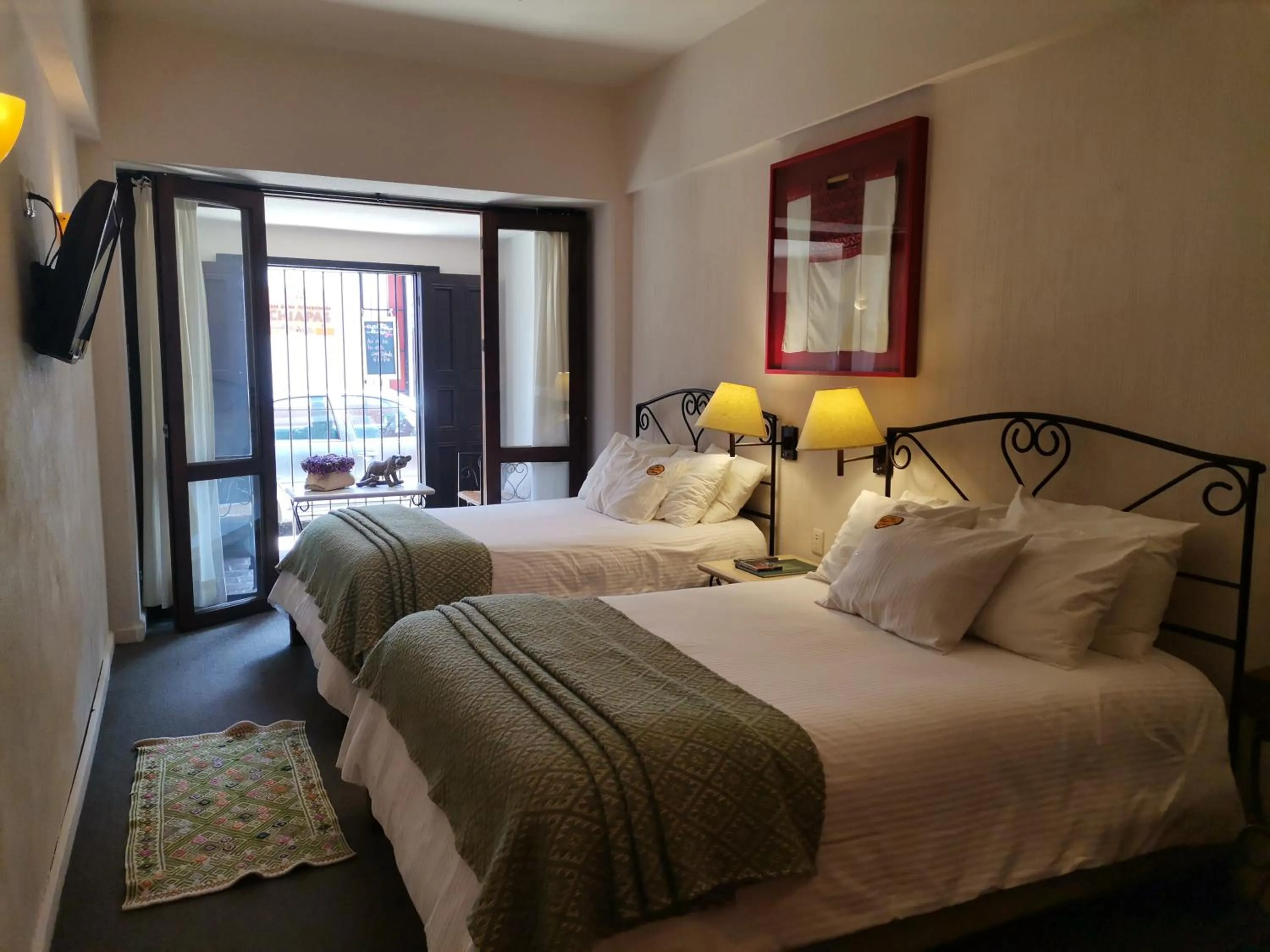 Bed in Mision Grand San Cristobal de las Casas