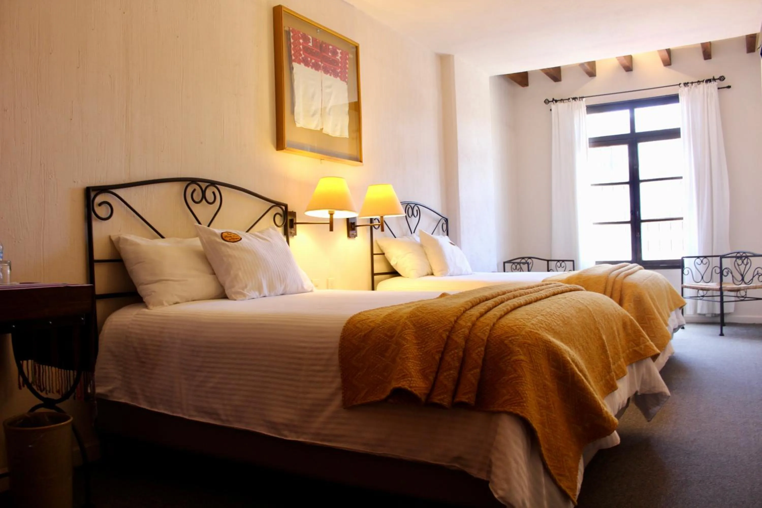 Bed in Mision Grand San Cristobal de las Casas