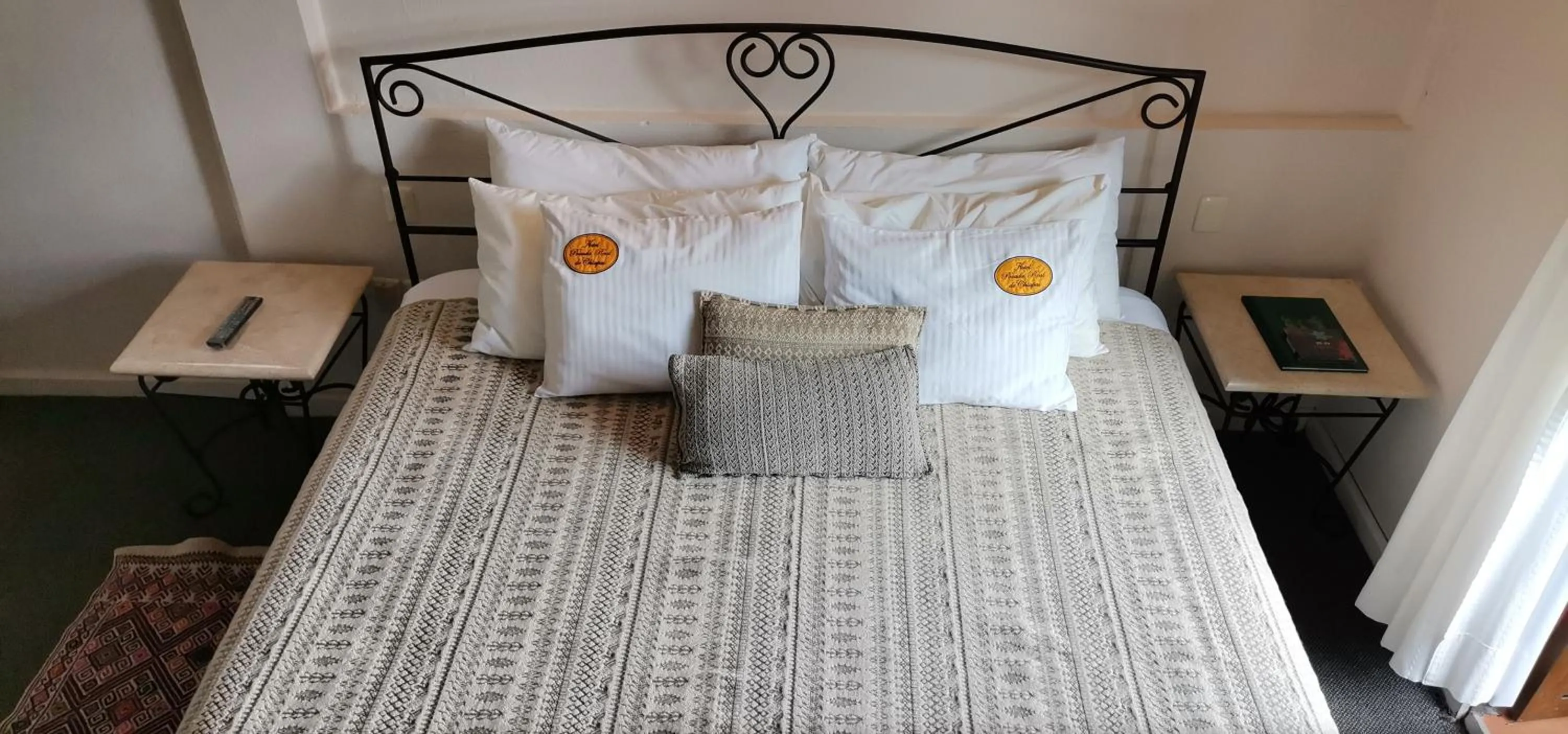 Bed in Mision Grand San Cristobal de las Casas