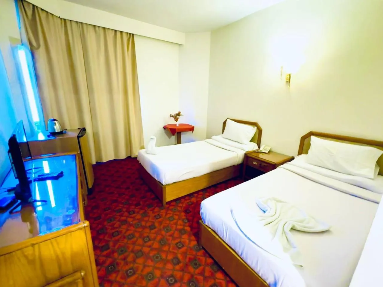 Bed in Queens Valley Hotel