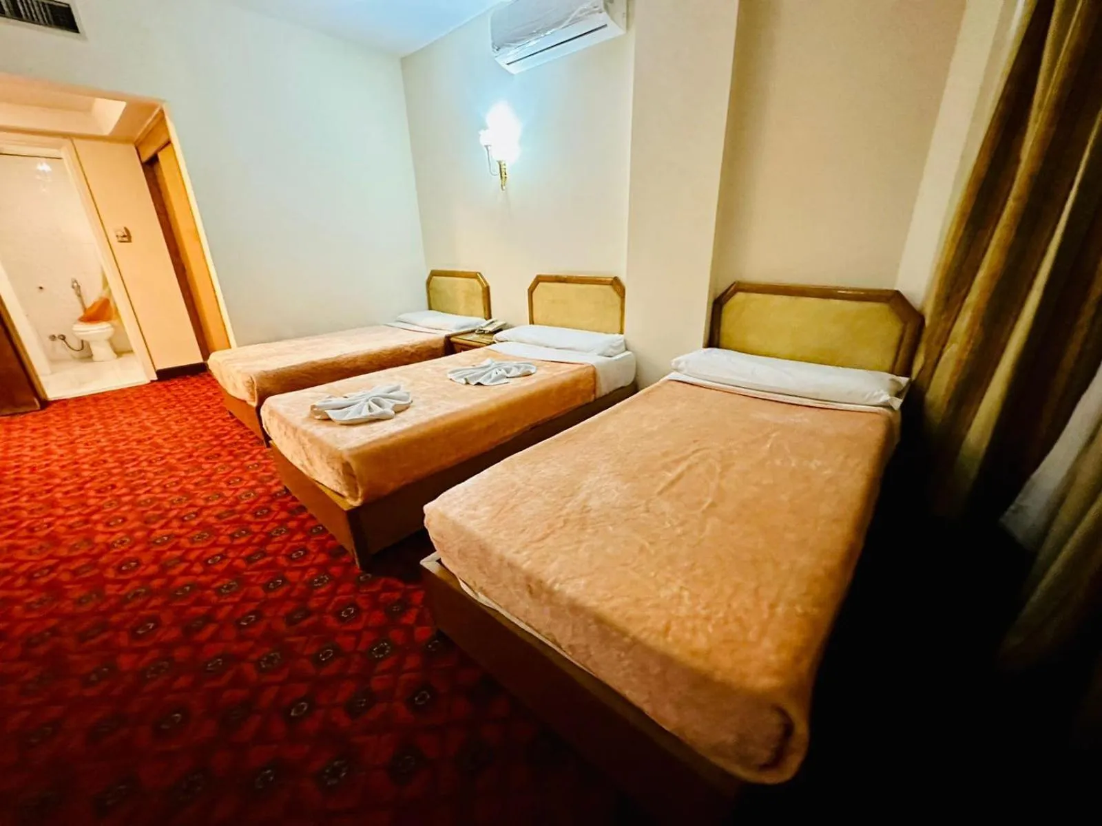 Bed in Queens Valley Hotel