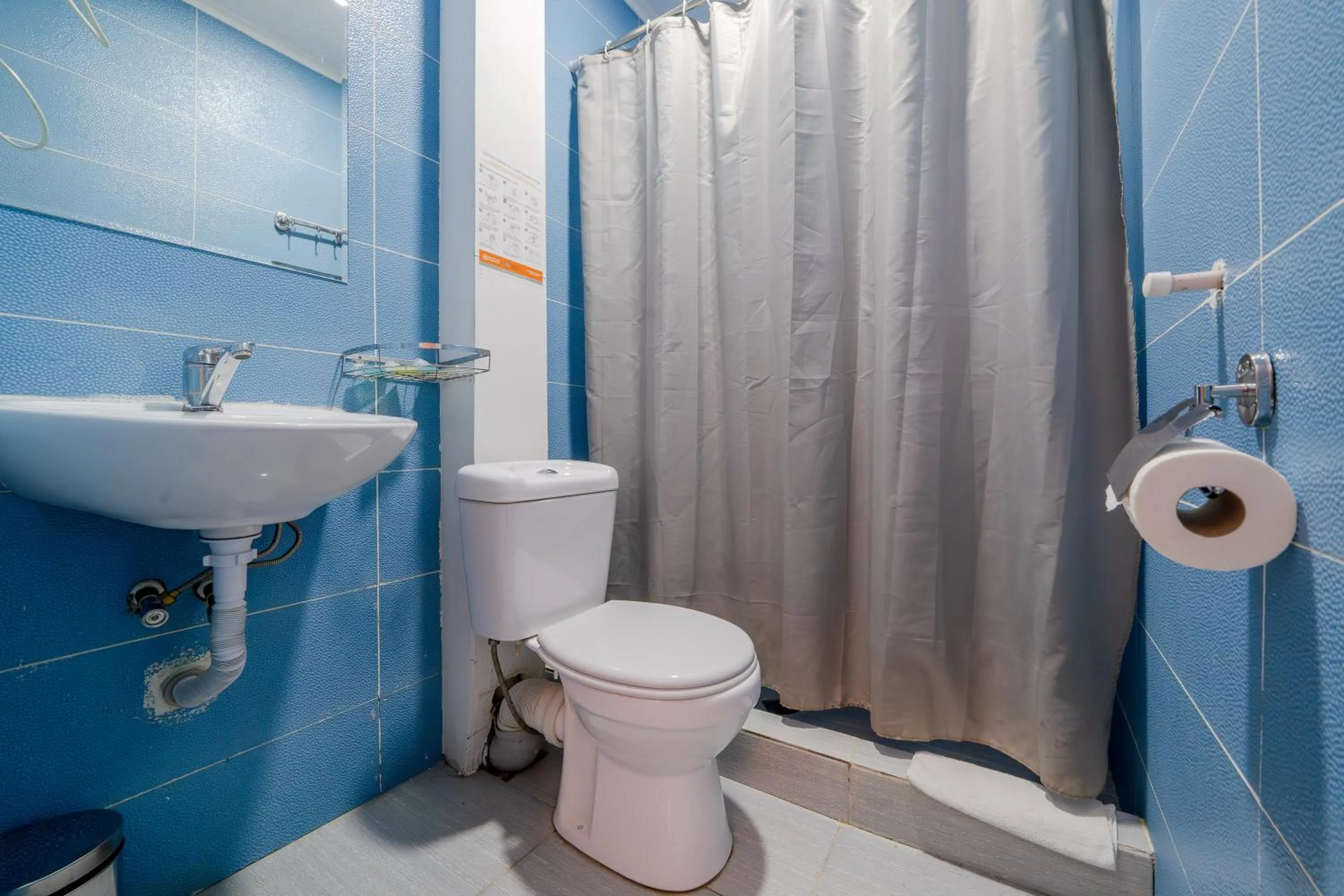 Shower in Hotel Tato & CoWorking space