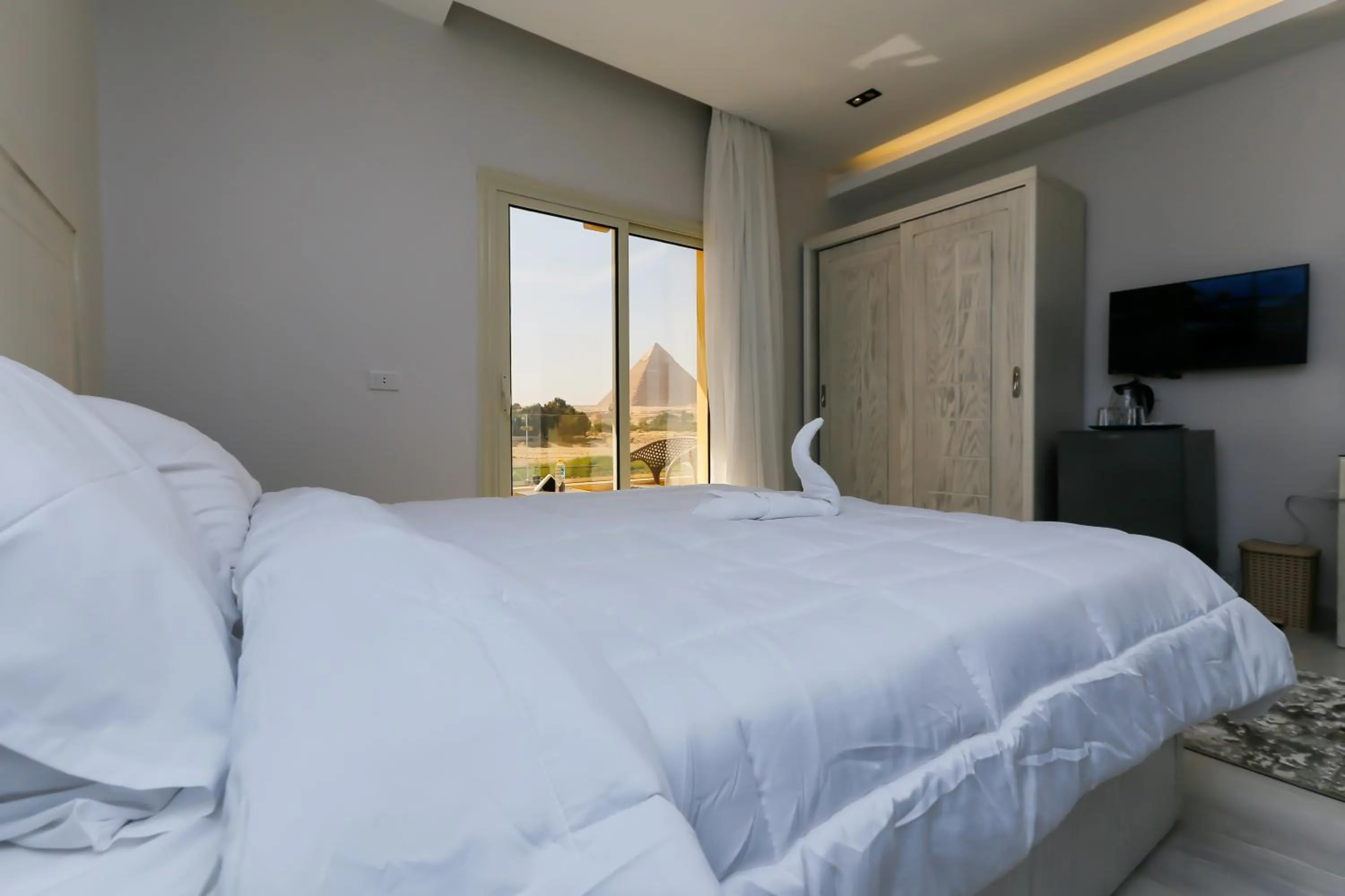 Bed in Pyramids Land Hotel