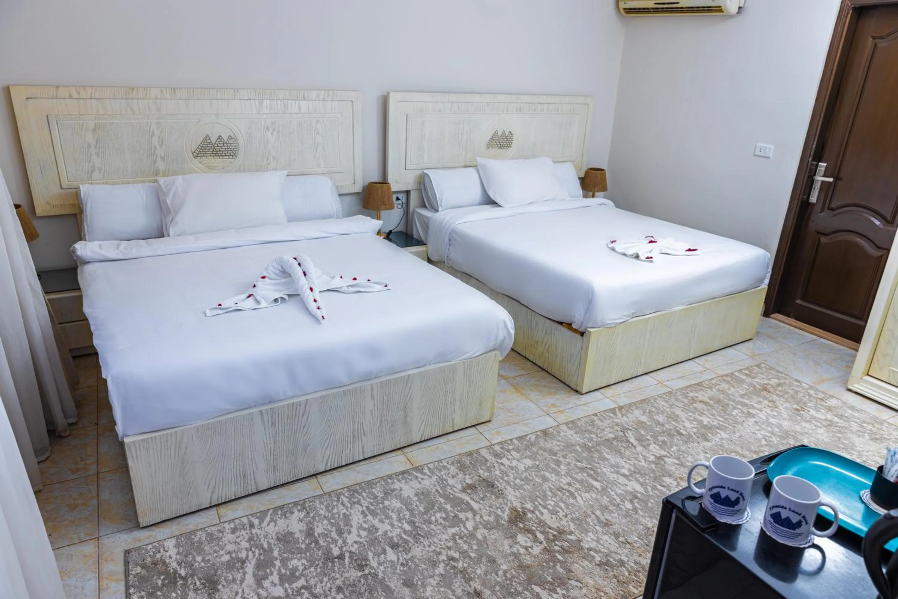 Bed in Pyramids Land Hotel