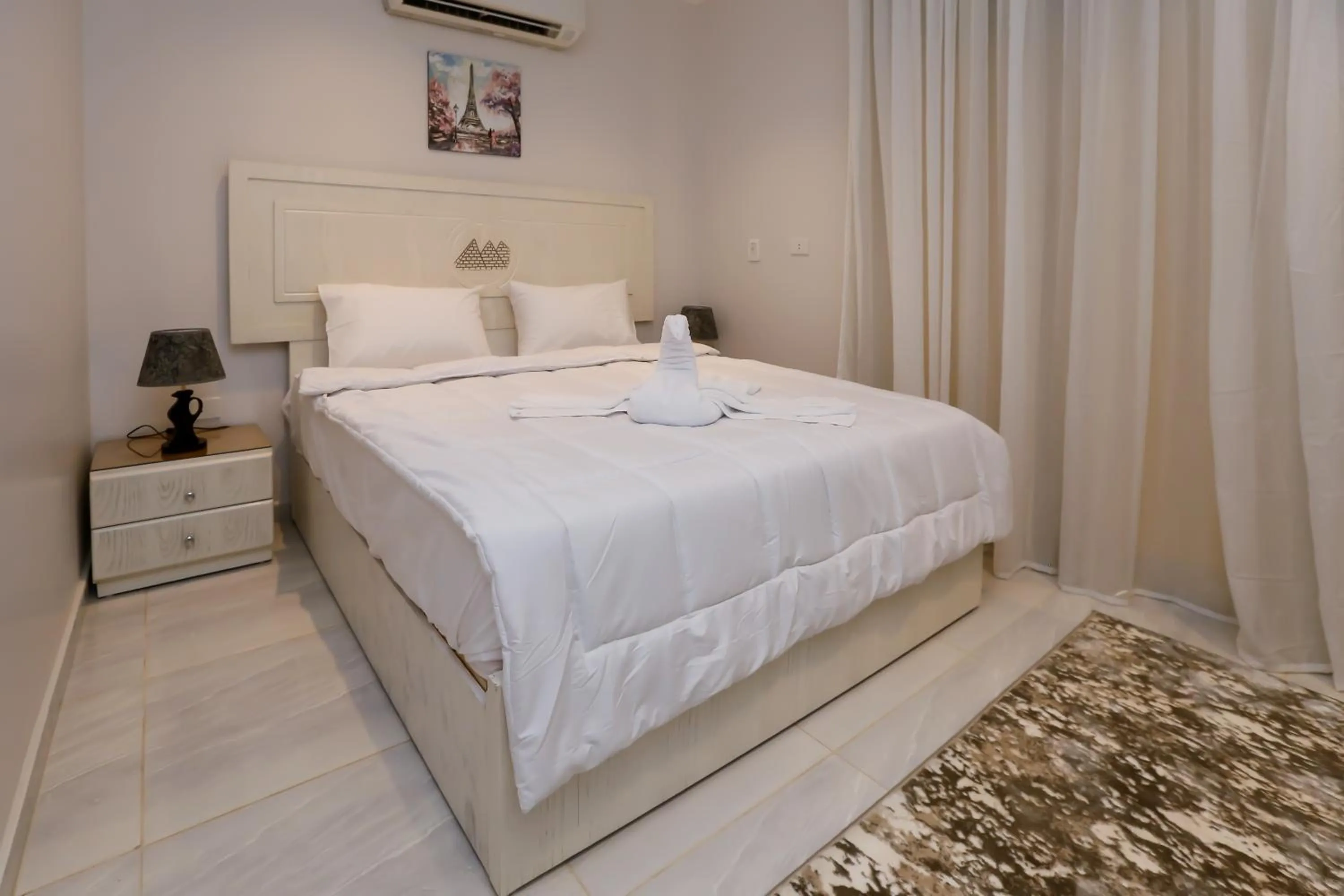 Bed in Pyramids Land Hotel