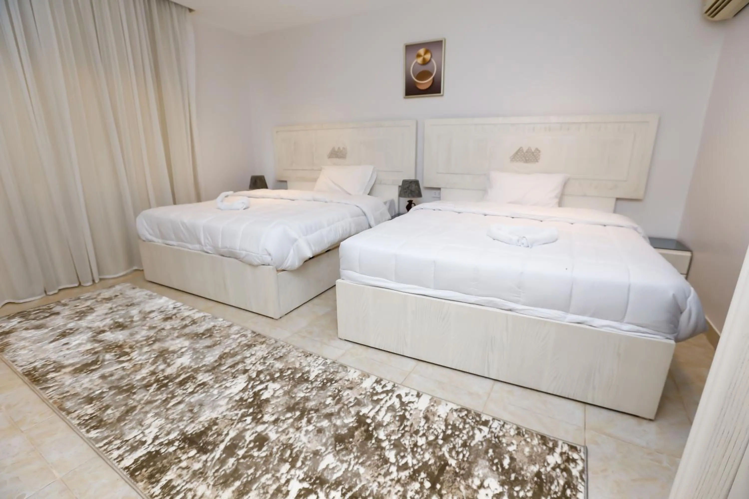 Bed in Pyramids Land Hotel