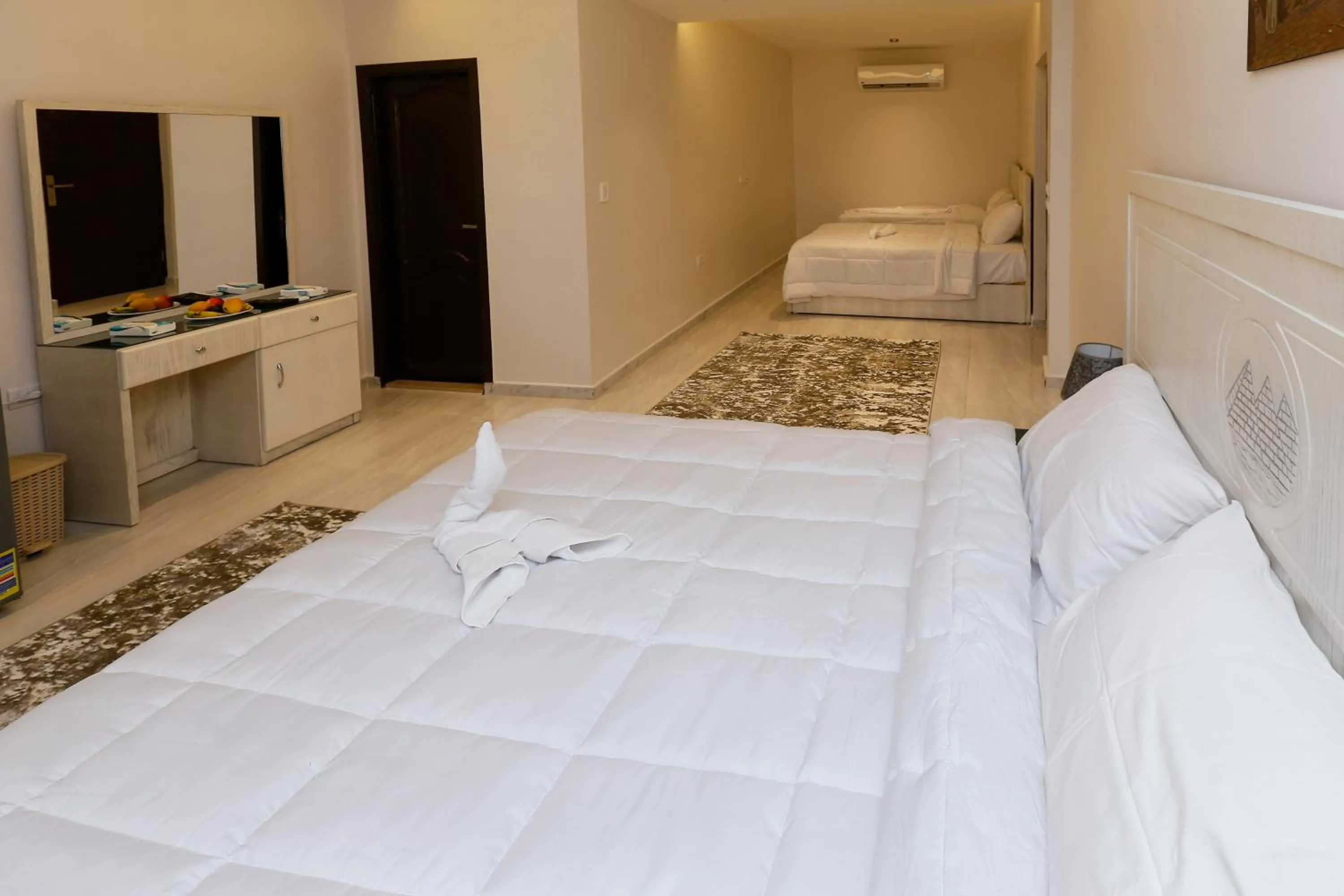 Bed in Pyramids Land Hotel