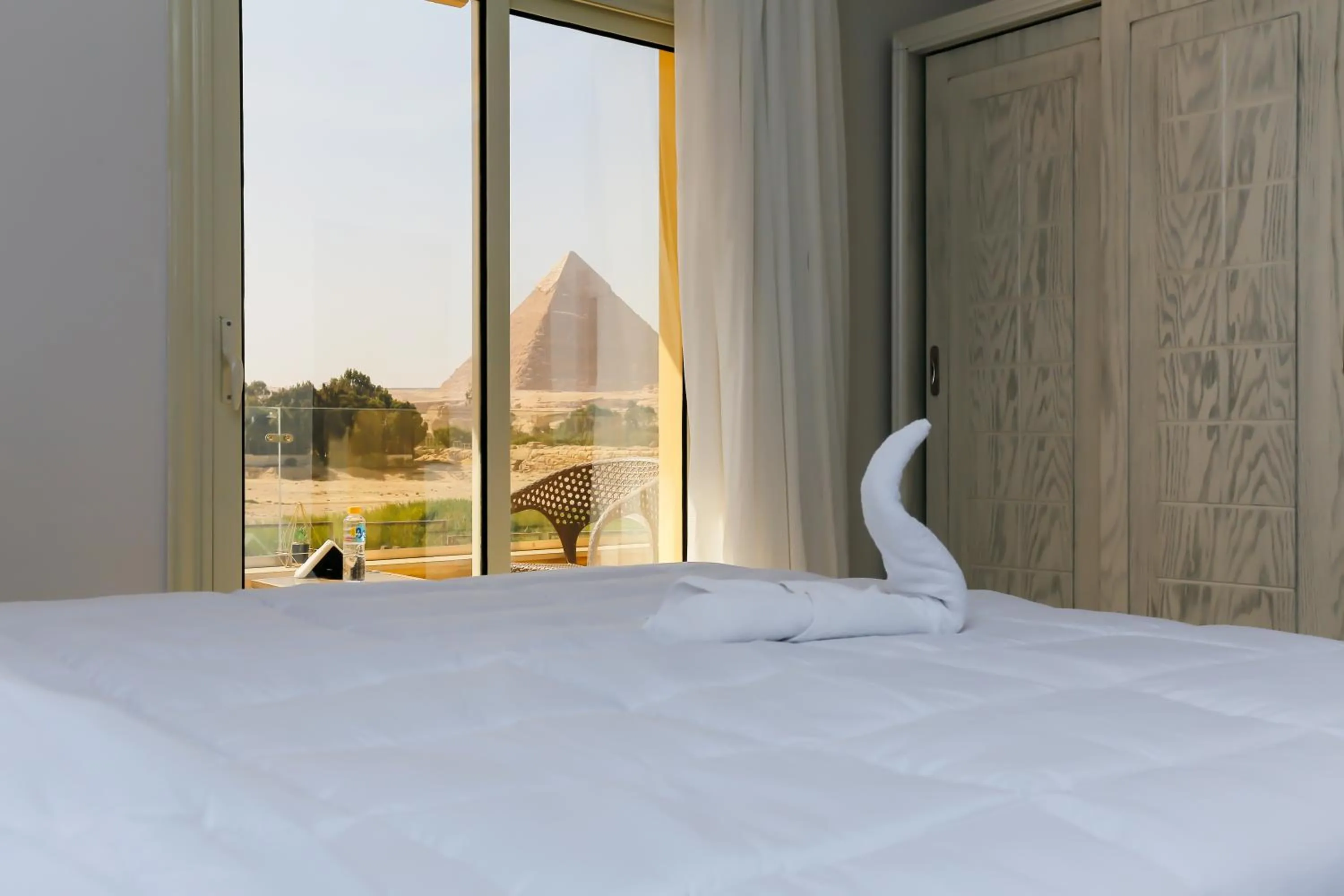 Bed in Pyramids Land Hotel