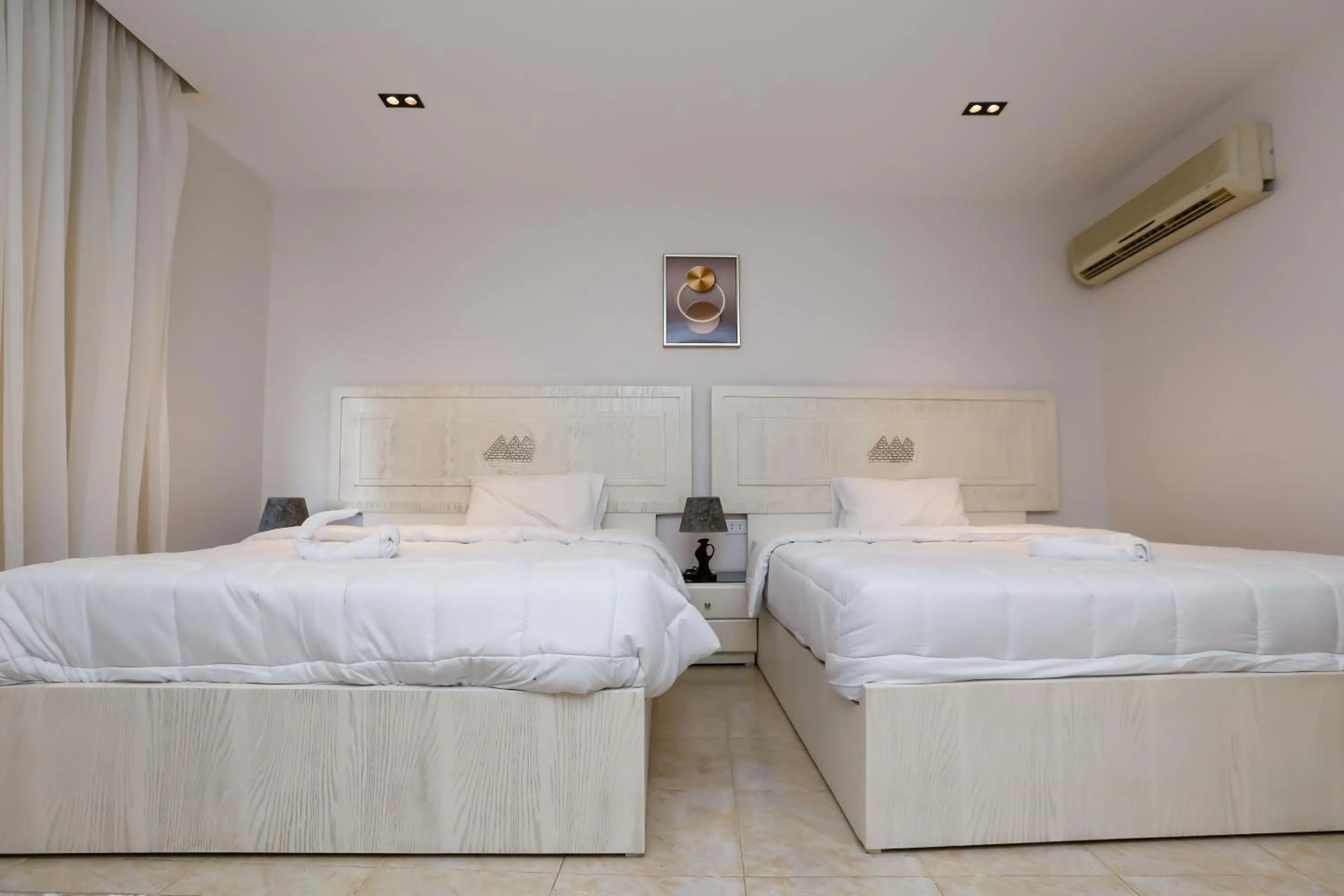 Bed in Pyramids Land Hotel