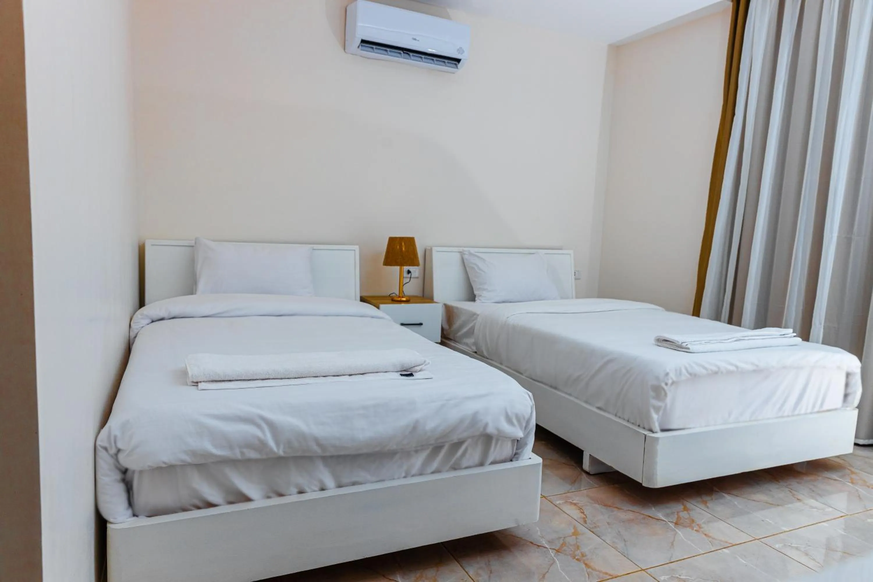 Bed in Pyramids Land Hotel