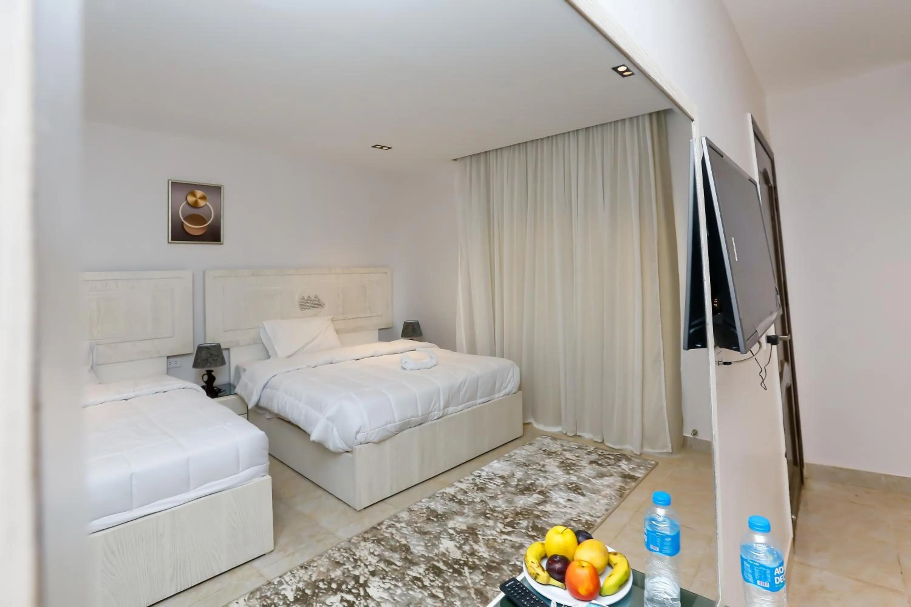 Bed in Pyramids Land Hotel