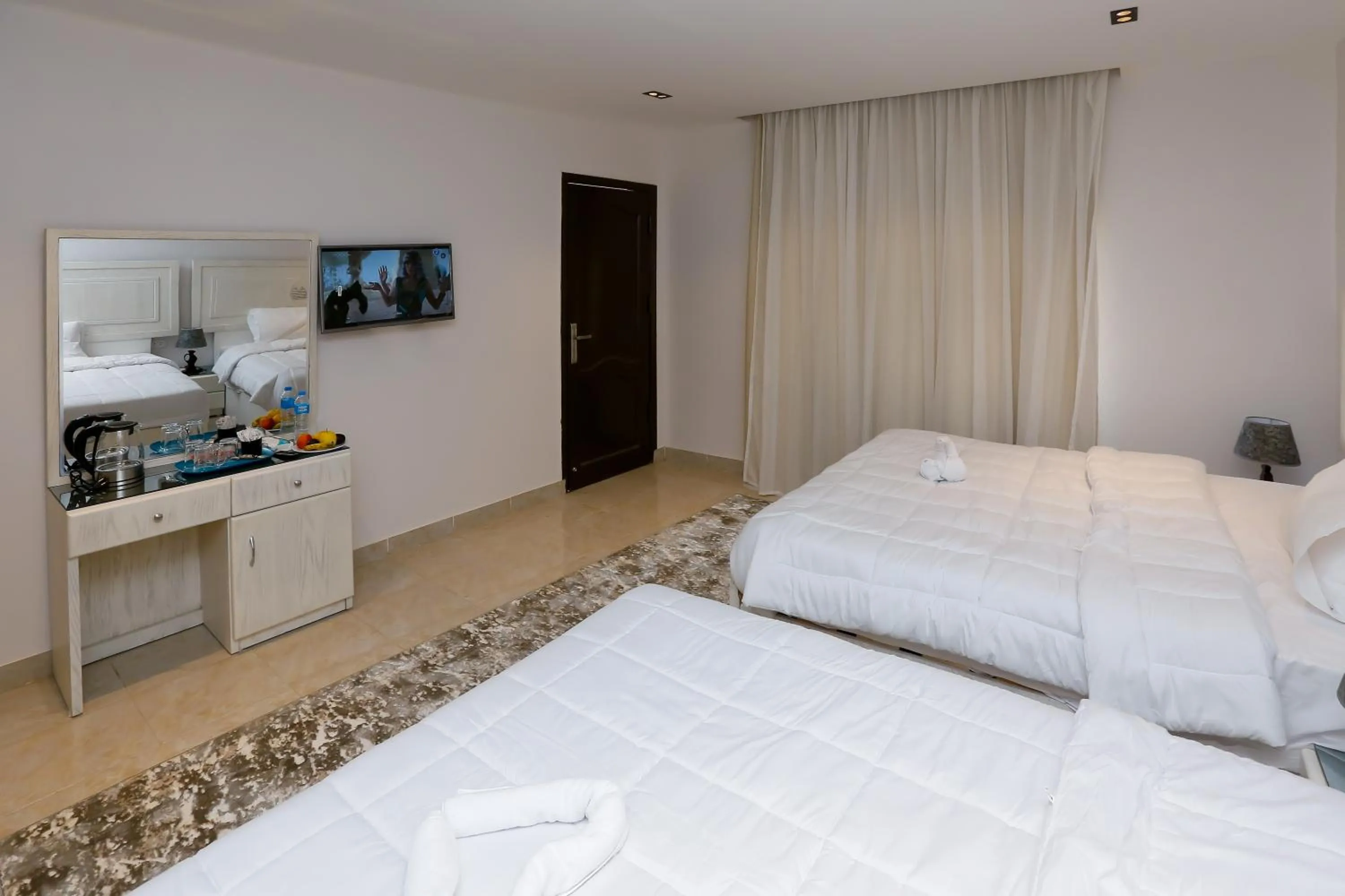 Bed in Pyramids Land Hotel