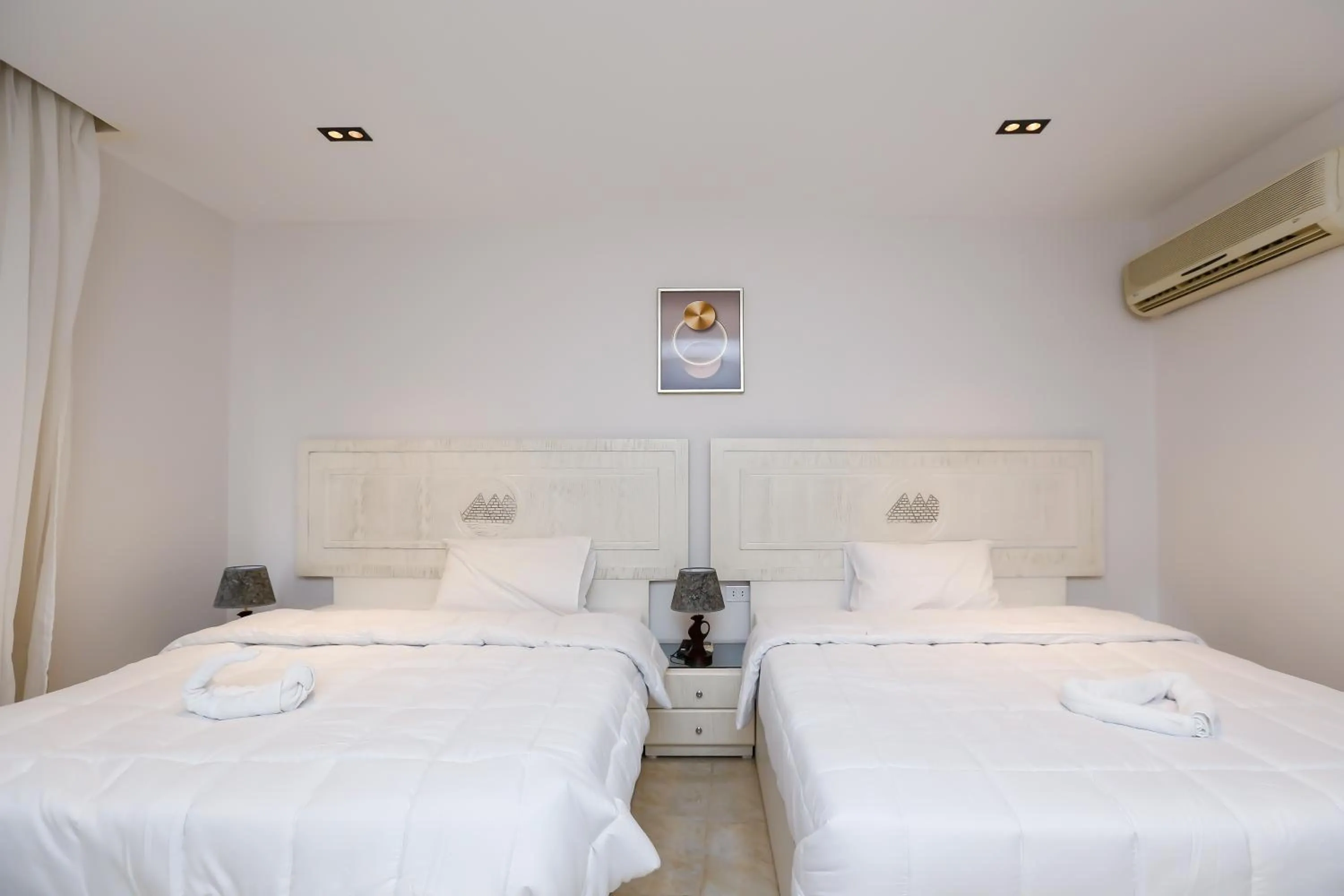 Bed in Pyramids Land Hotel