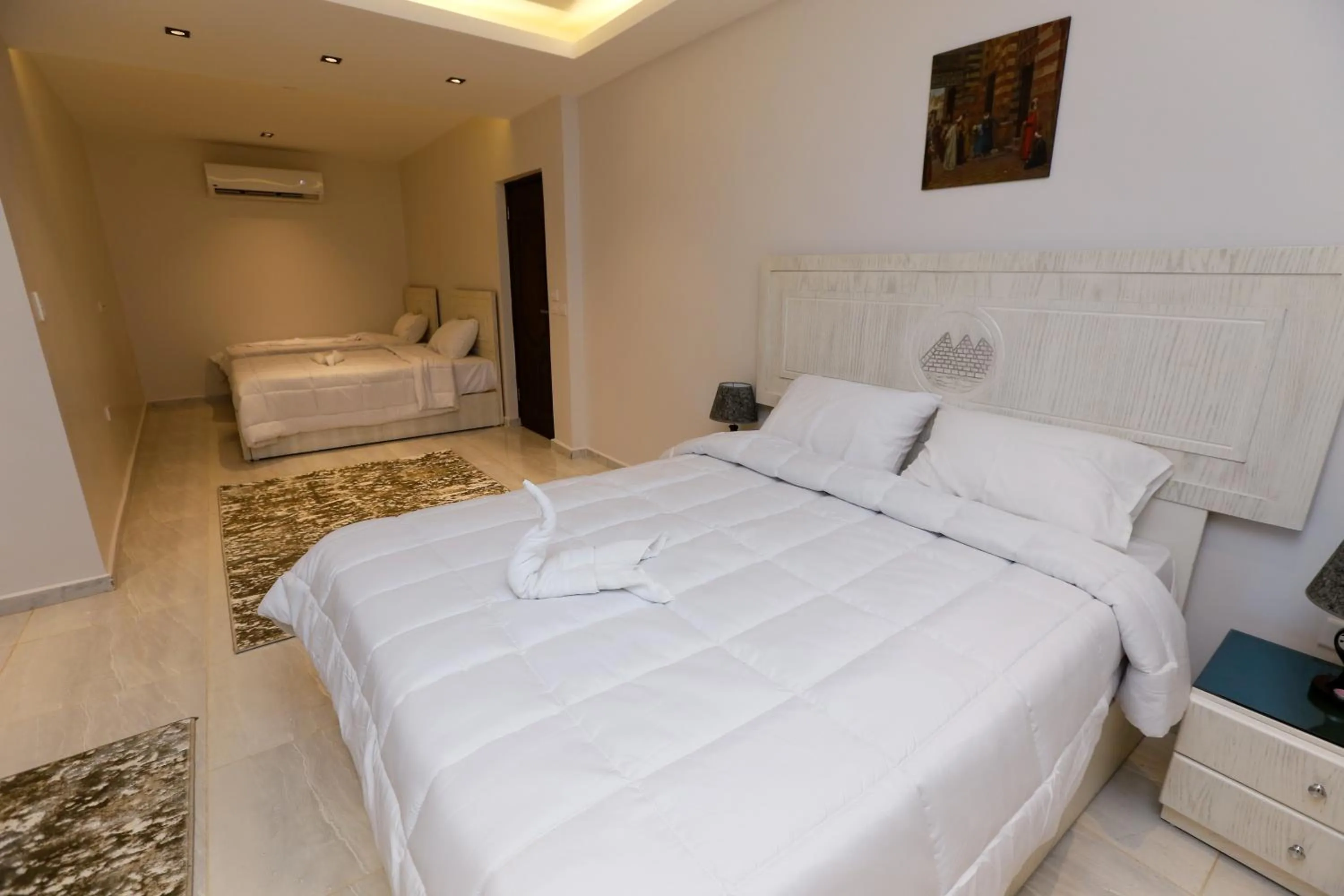 Bed in Pyramids Land Hotel