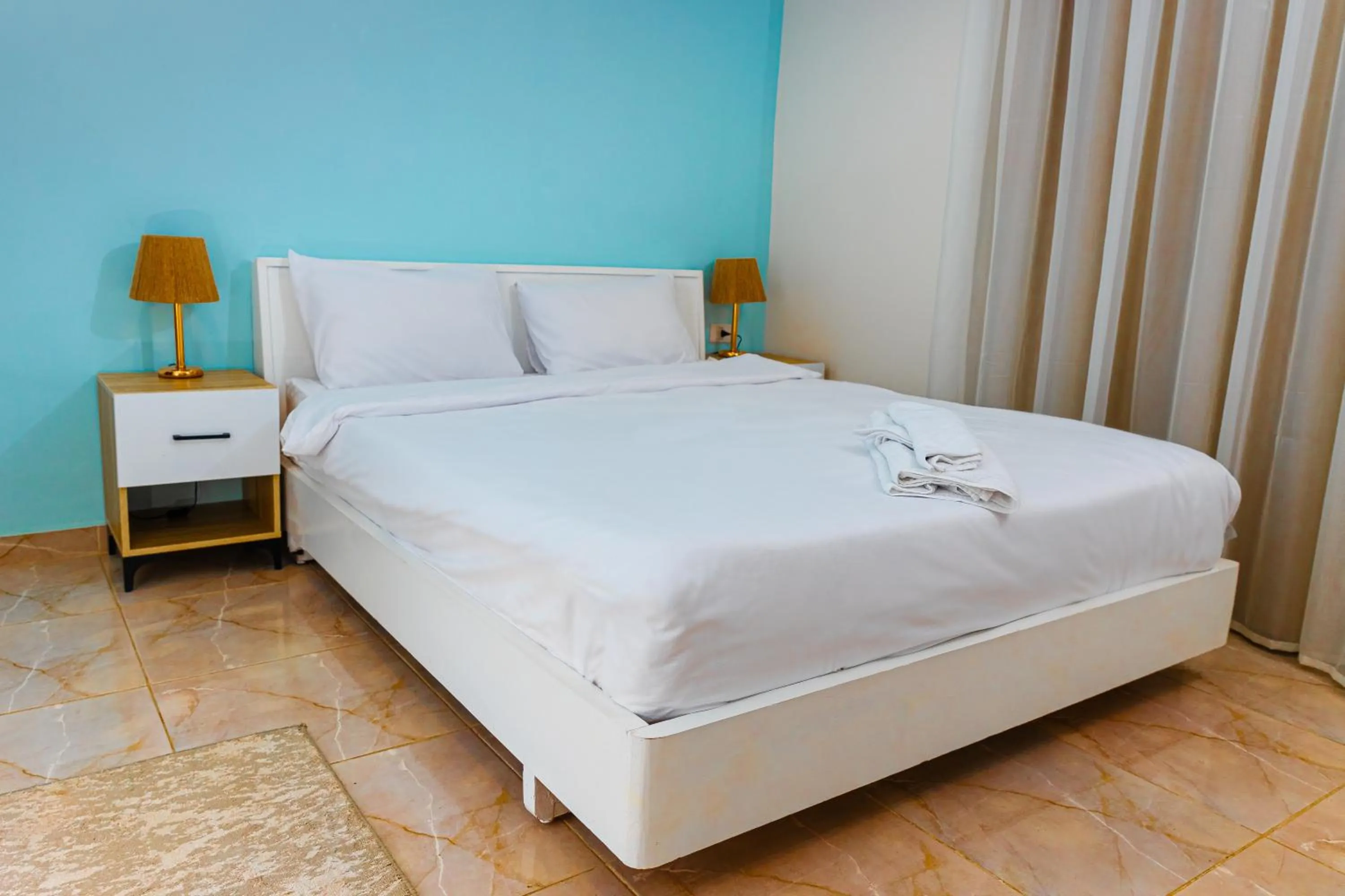 Bed in Pyramids Land Hotel