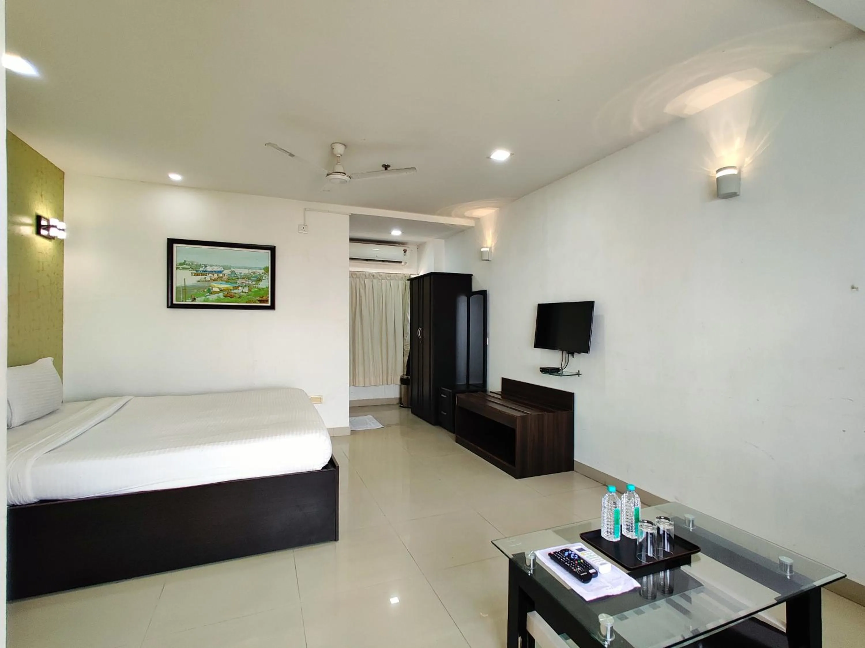 Bed in Golden Chariot Hotel Daman